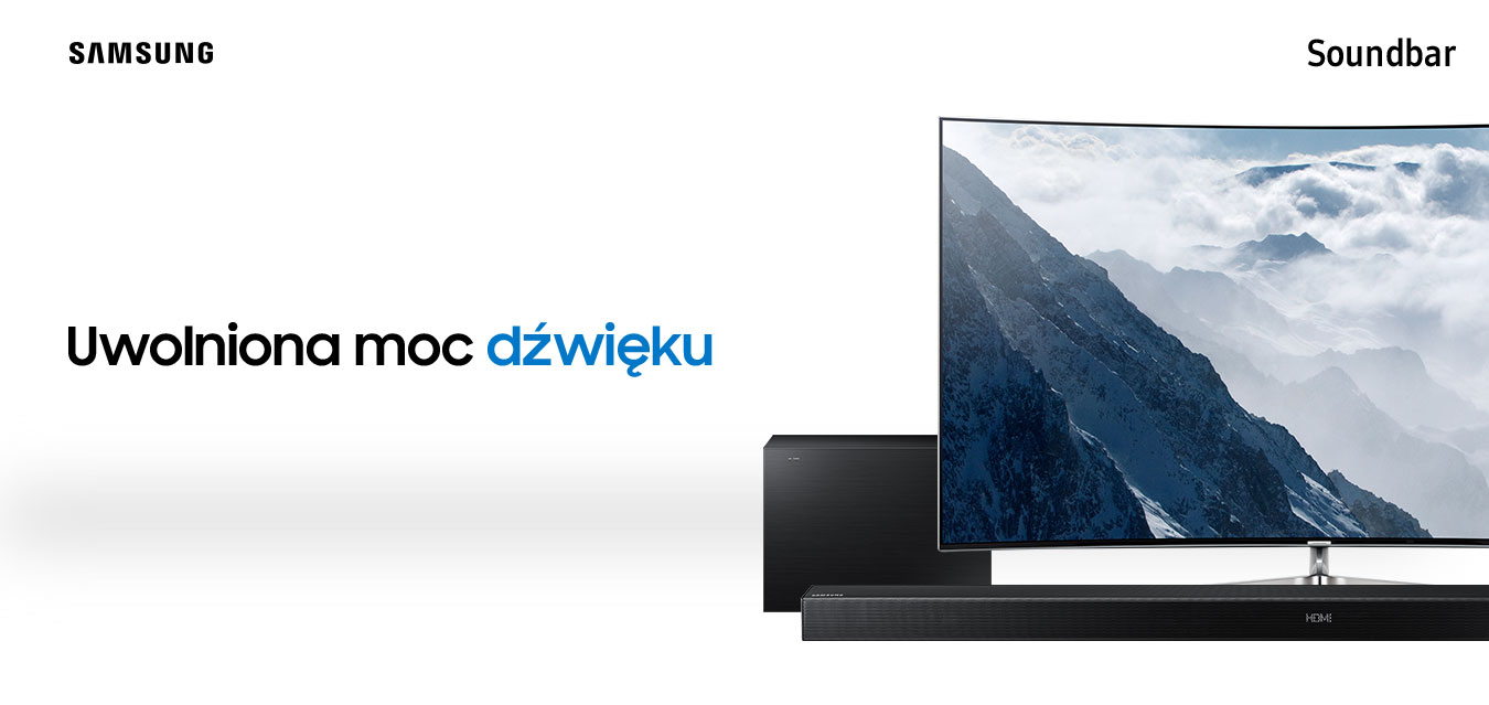 Czarny soundbar Samsung stojący pod telewizorem Samsung, za nim znajduje się czarny subwoofer.