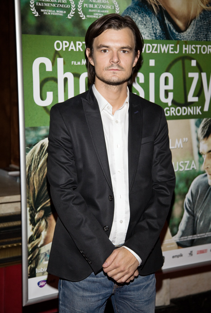 Dawid Ogrodnik na premierze