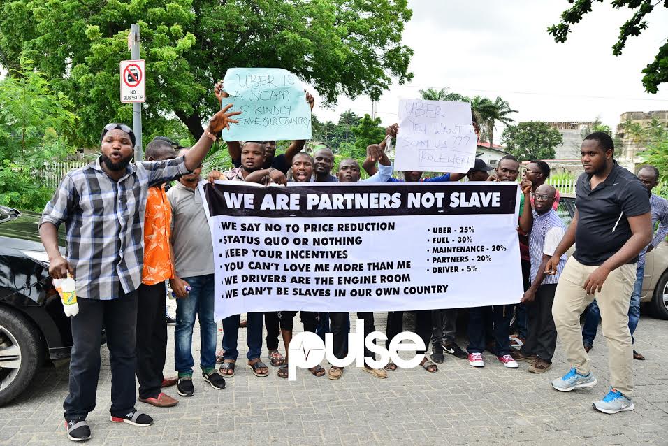 Uber drivers protesting price cuts in front of Uber Nigeria's offices in Ikoyi, Lagos. 
