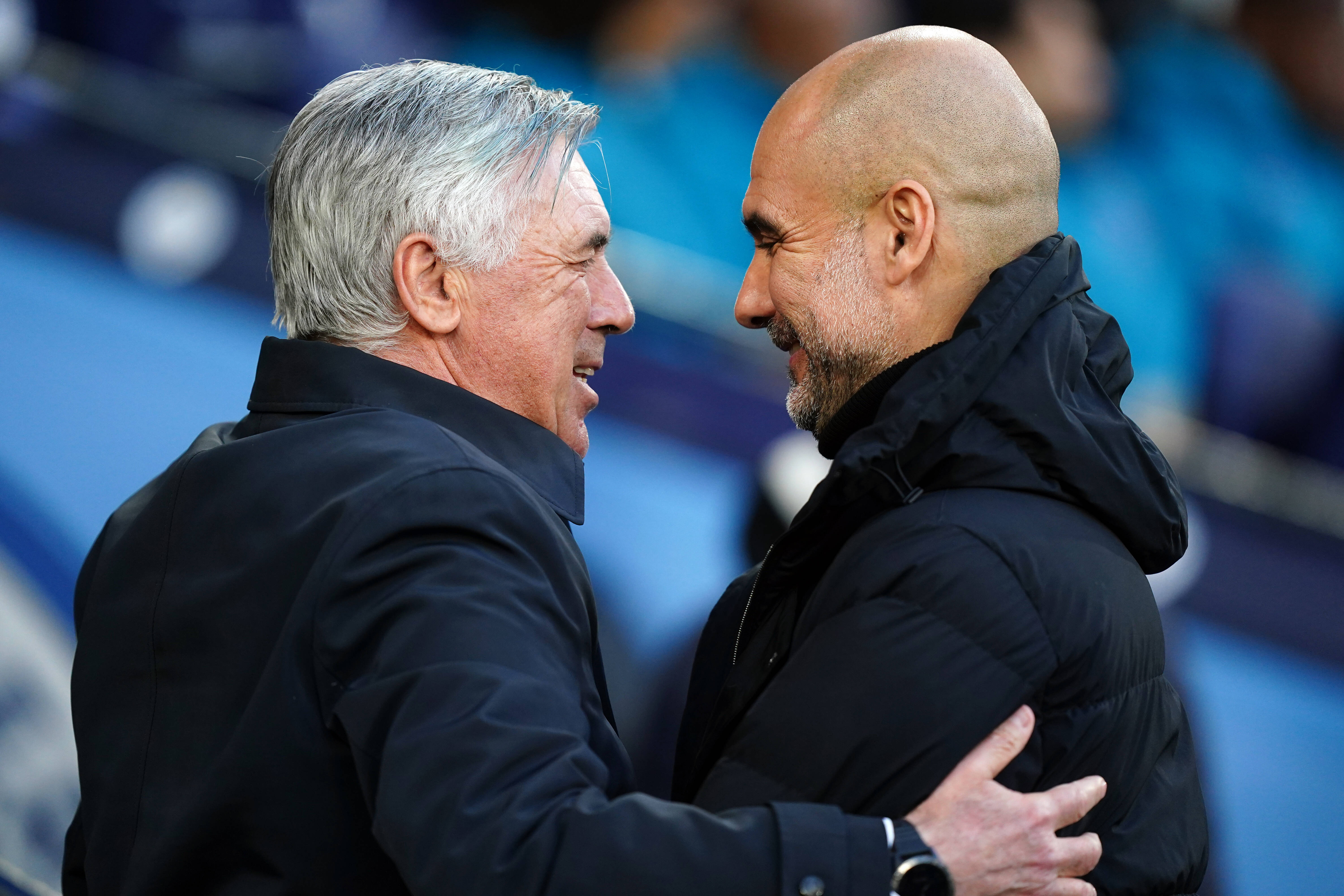 Pep Guardiola and Carlo Ancelotti come together after the match 