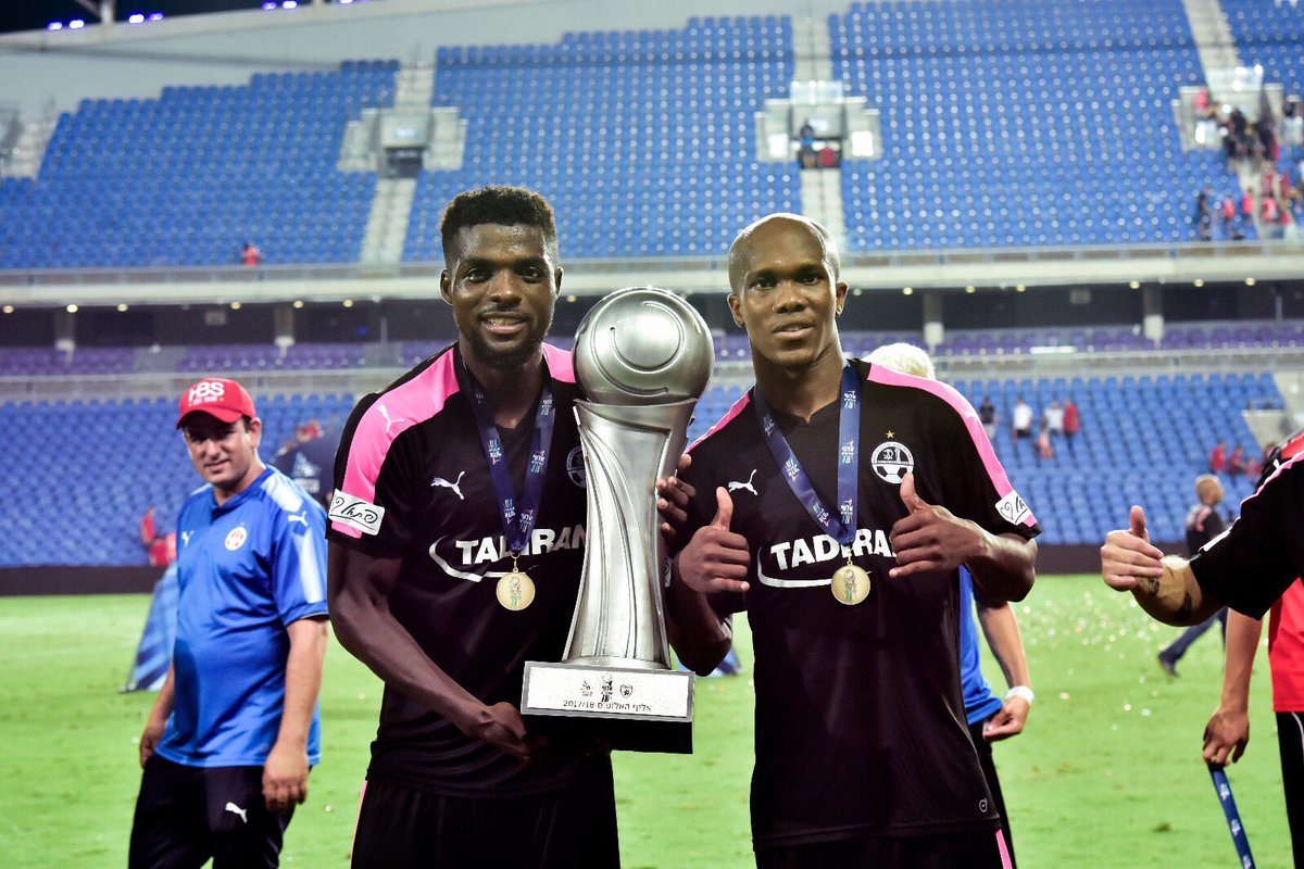 John Ogu-pictured here (left) with his compatriot and teammate at Be'er Sheva Anthony Nwakaeme) won four major titles in Israel 