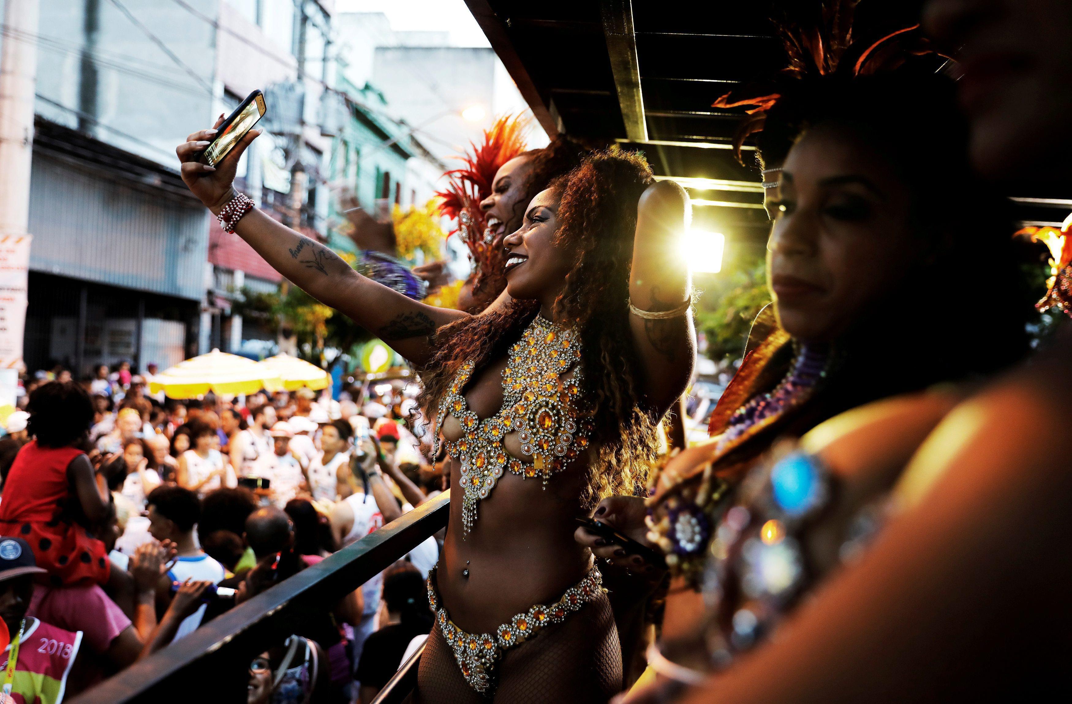 Women take part in block party during carnival festivities at Bixiga neighbourhood in Sao Paulo