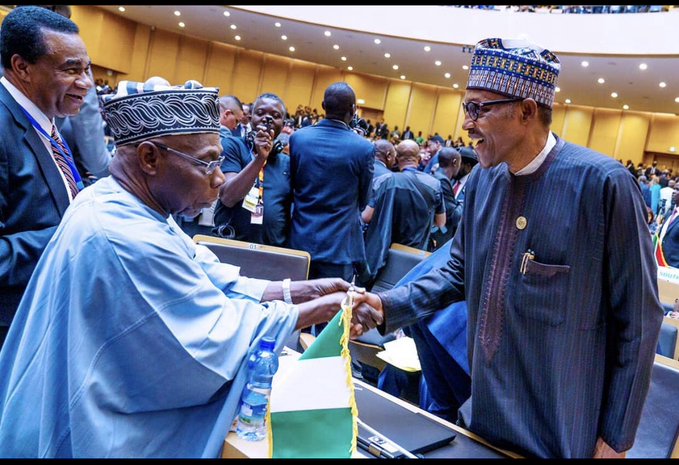 Former Nigeria’s President Chief Olusegun Obasanjo and current President Muhammadu Buhari. [Twitter/@BashirAhmaad]