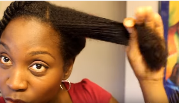 Combing natural hair can be a little hard [YouTube/ Discovering Natural]