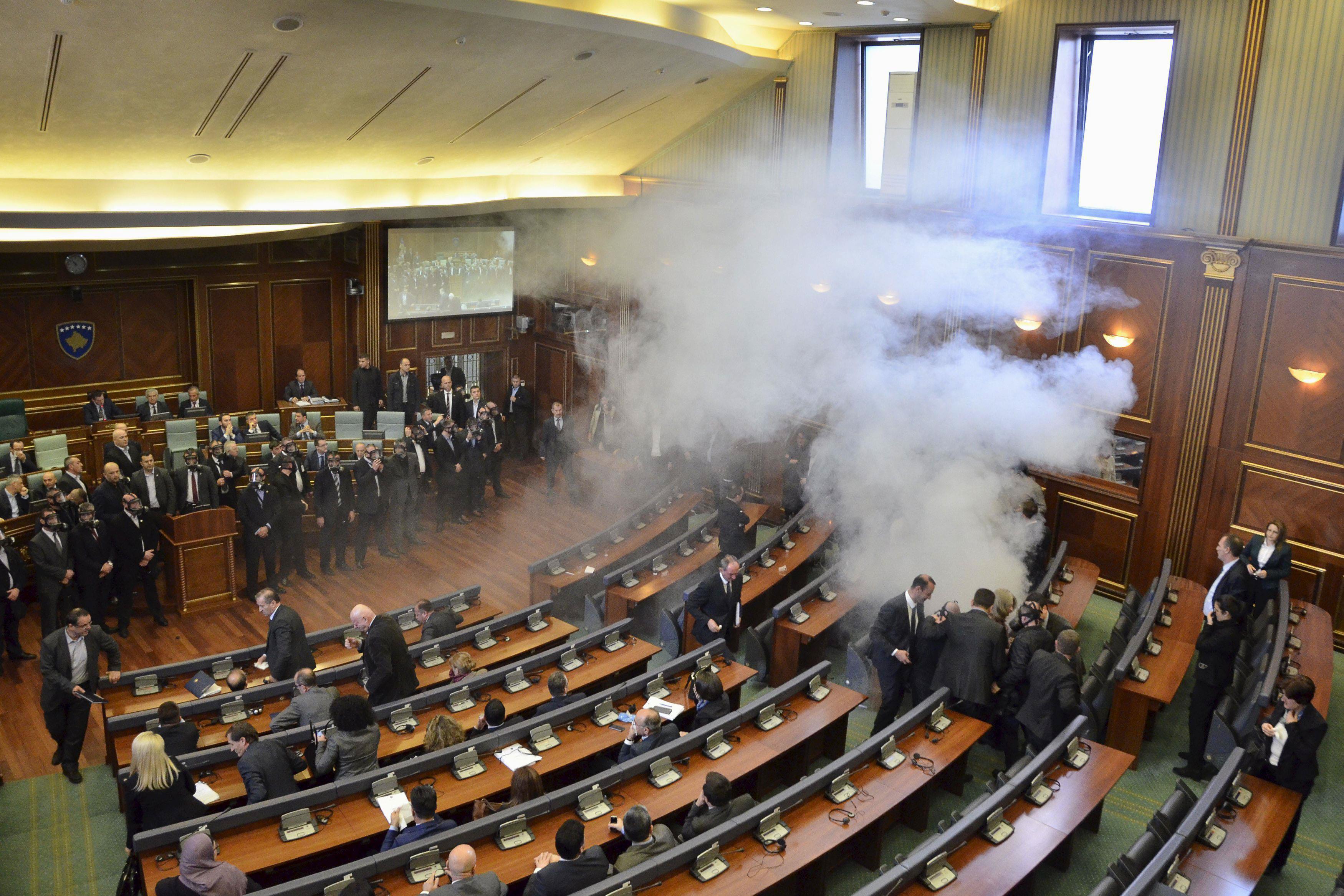 Opposition politicians release tear gas in parliament to obstruct a session in Pristina