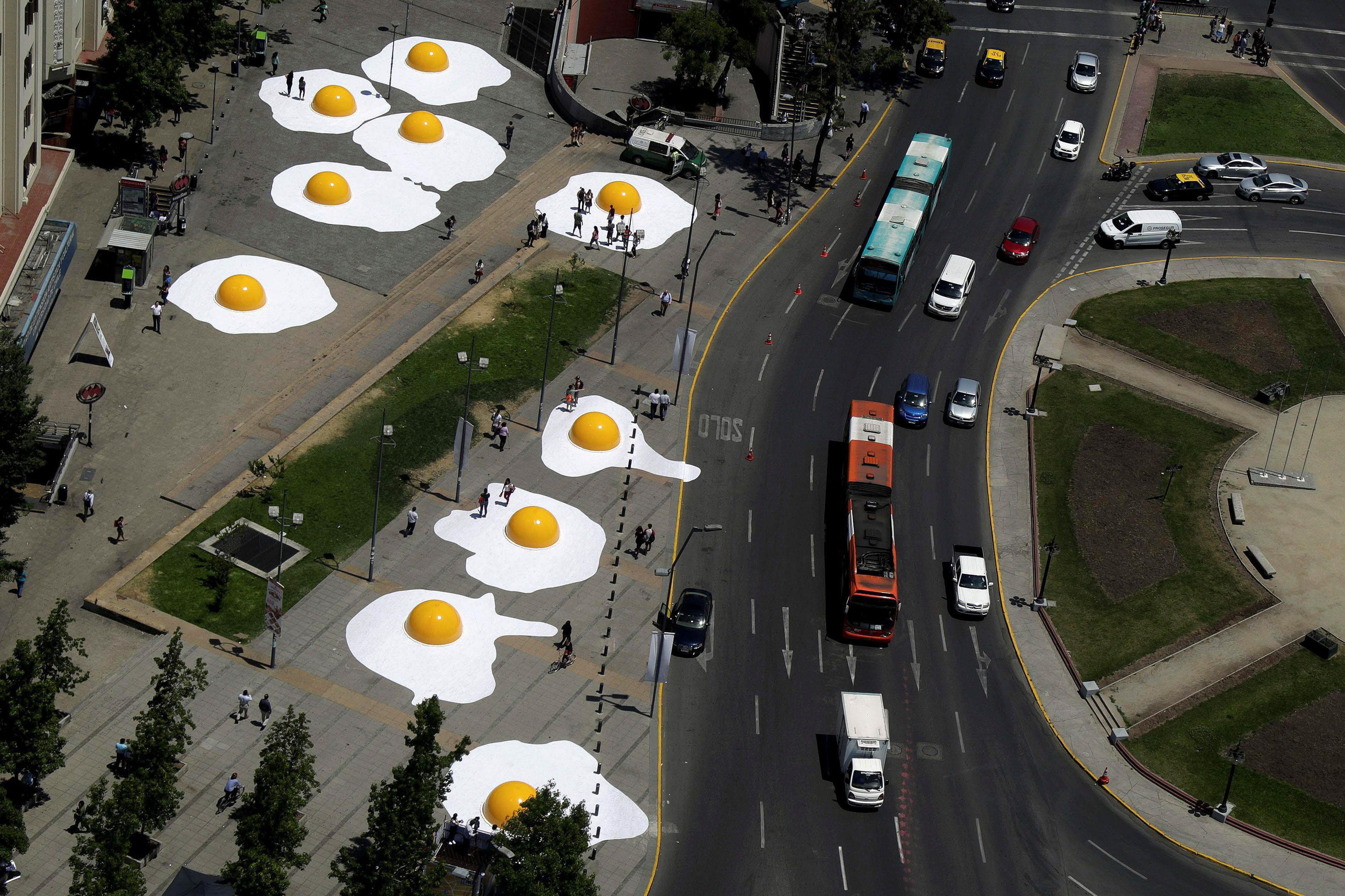 Giant fried eggs art installation are seen as part of 