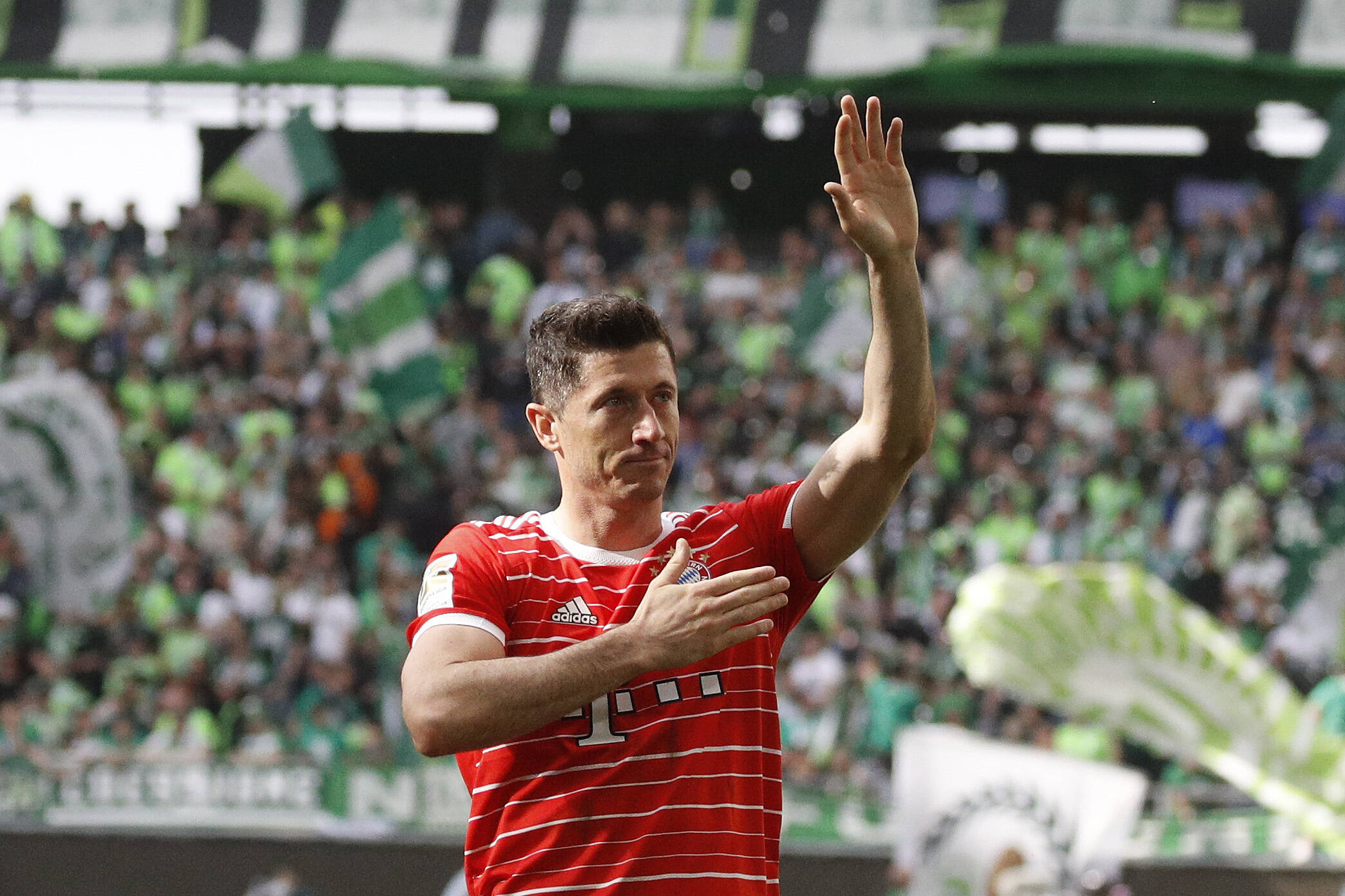 Lewandowski waving at Bayern fans after their final game of the season