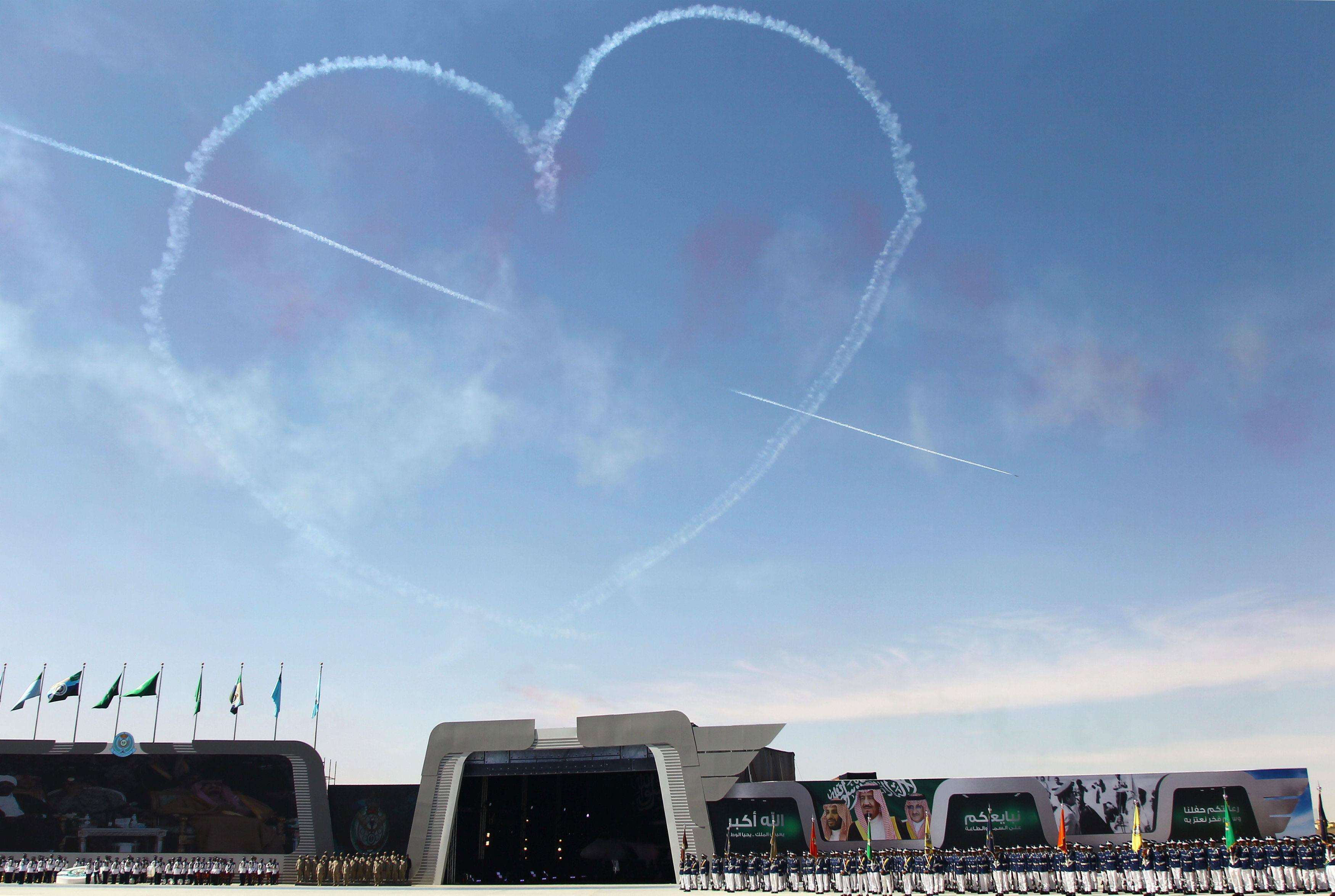 Aircrafts make heart symbol during a graduation ceremony and air show marking the 50th anniversary o