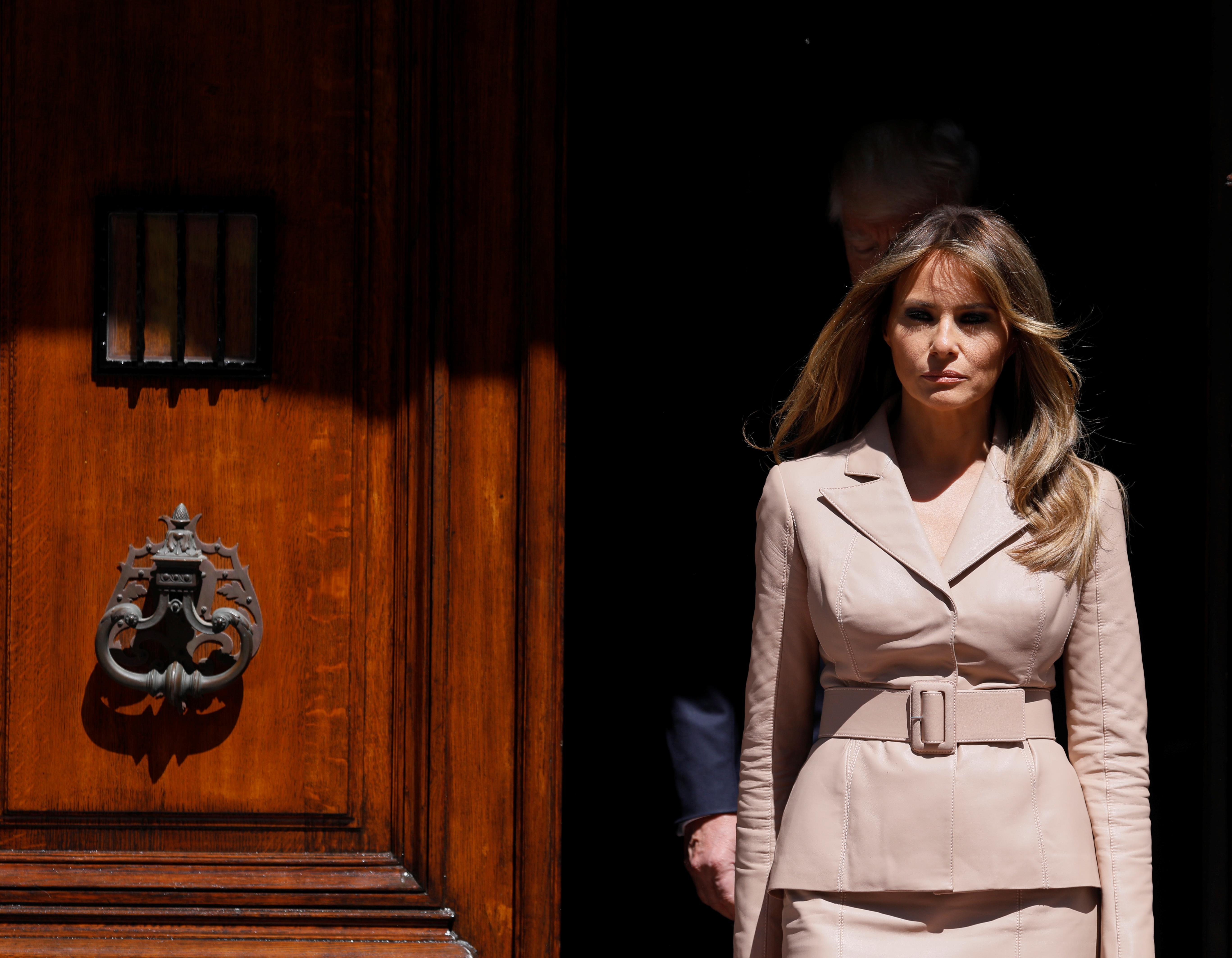 U.S. first lady Melania Trump waits the arrival of French President Macron before a lunch ahead of a