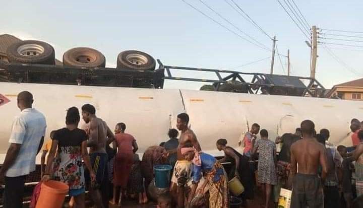 Video: Petrol tanker overturns as residents rush to siphon fuel at Pokuase