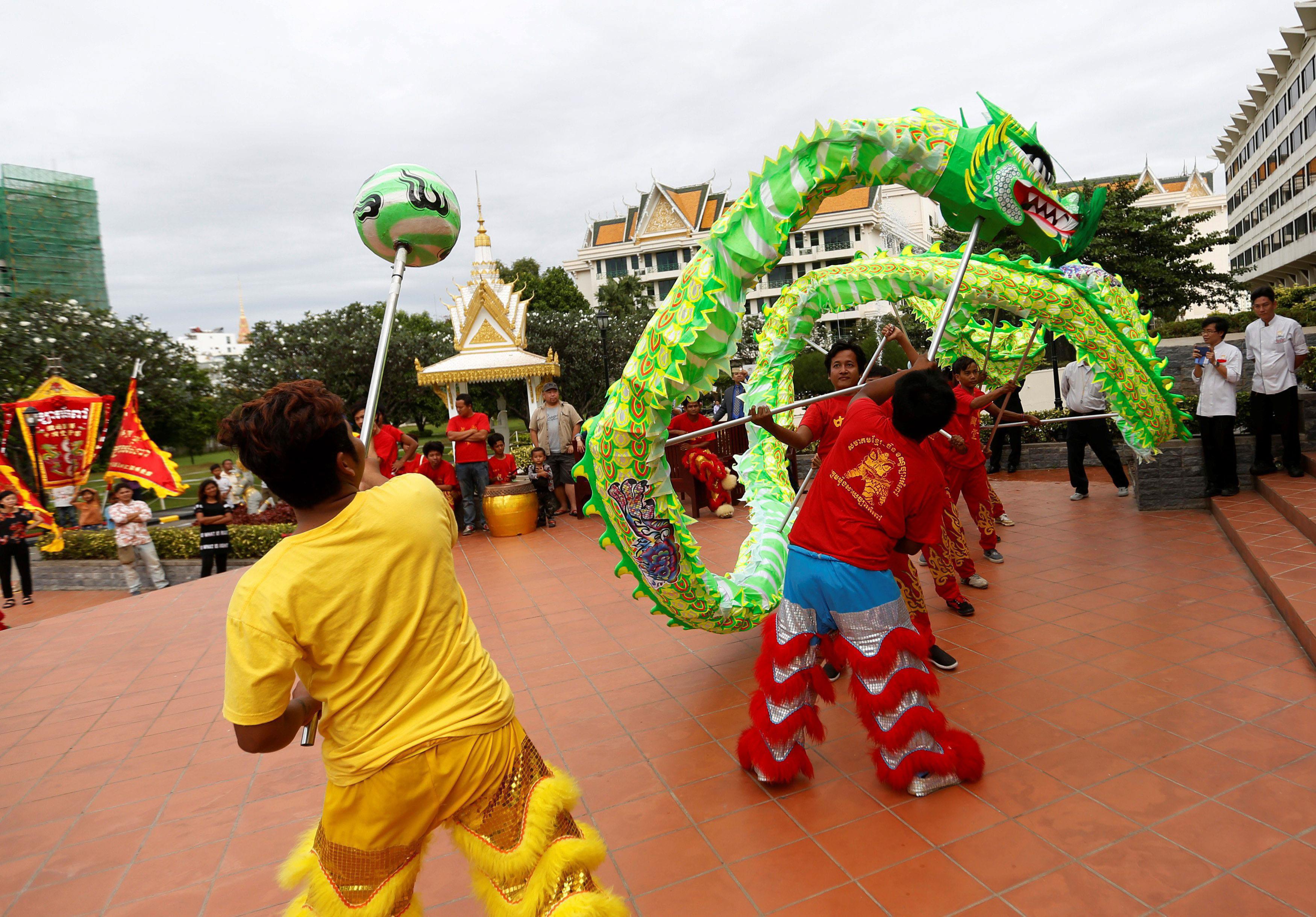 Men perform a lion dance ahead of the Chinese Lunar New Year in Phnom Penh