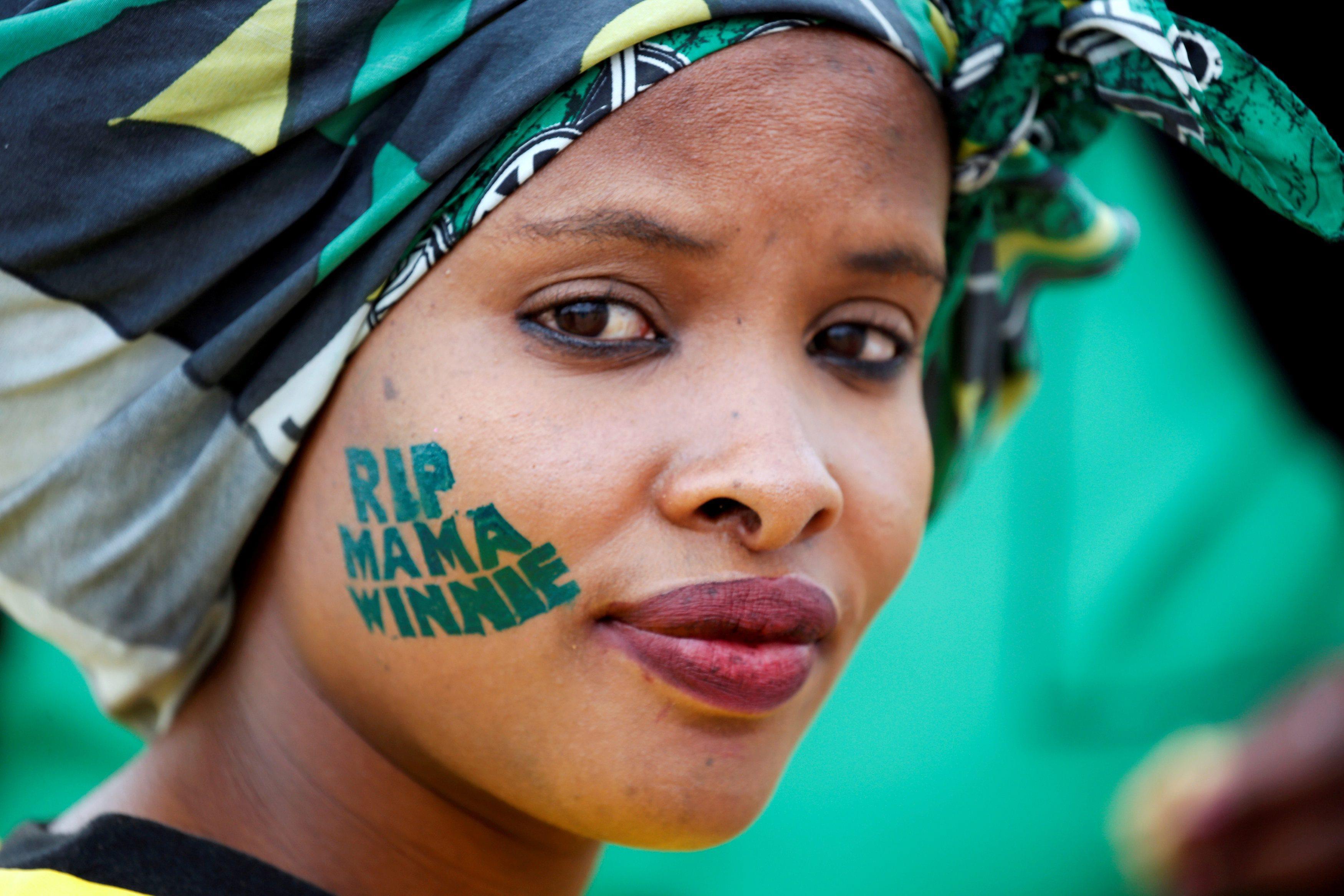 An African National Congress (ANC) supporter arrives at a memorial service for Winnie Madikizela-Man