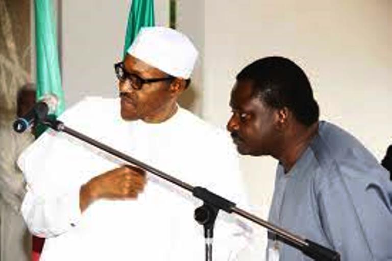 President Muhammadu Buhari and Femi Adesina (Vanguard)