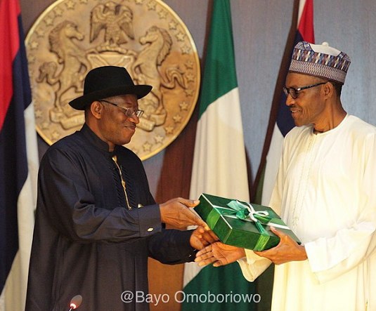President Goodluck Jonathan presents handover documents to President-elect, Muhammadu Buhari in 2015 (Presidency)