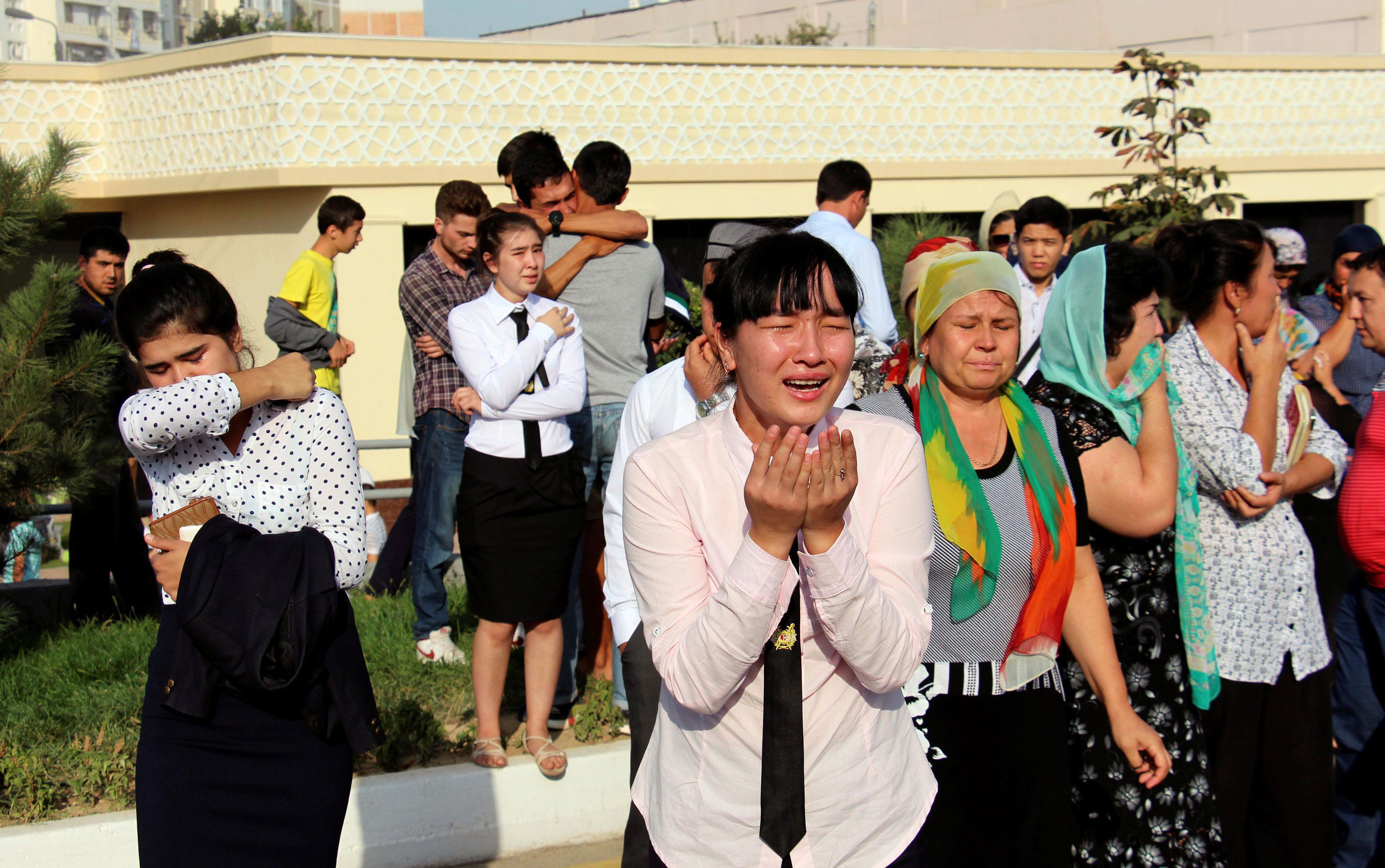 People gather to pay the tribute to the memory of Uzbek late President Islam Karimov in Tashkent