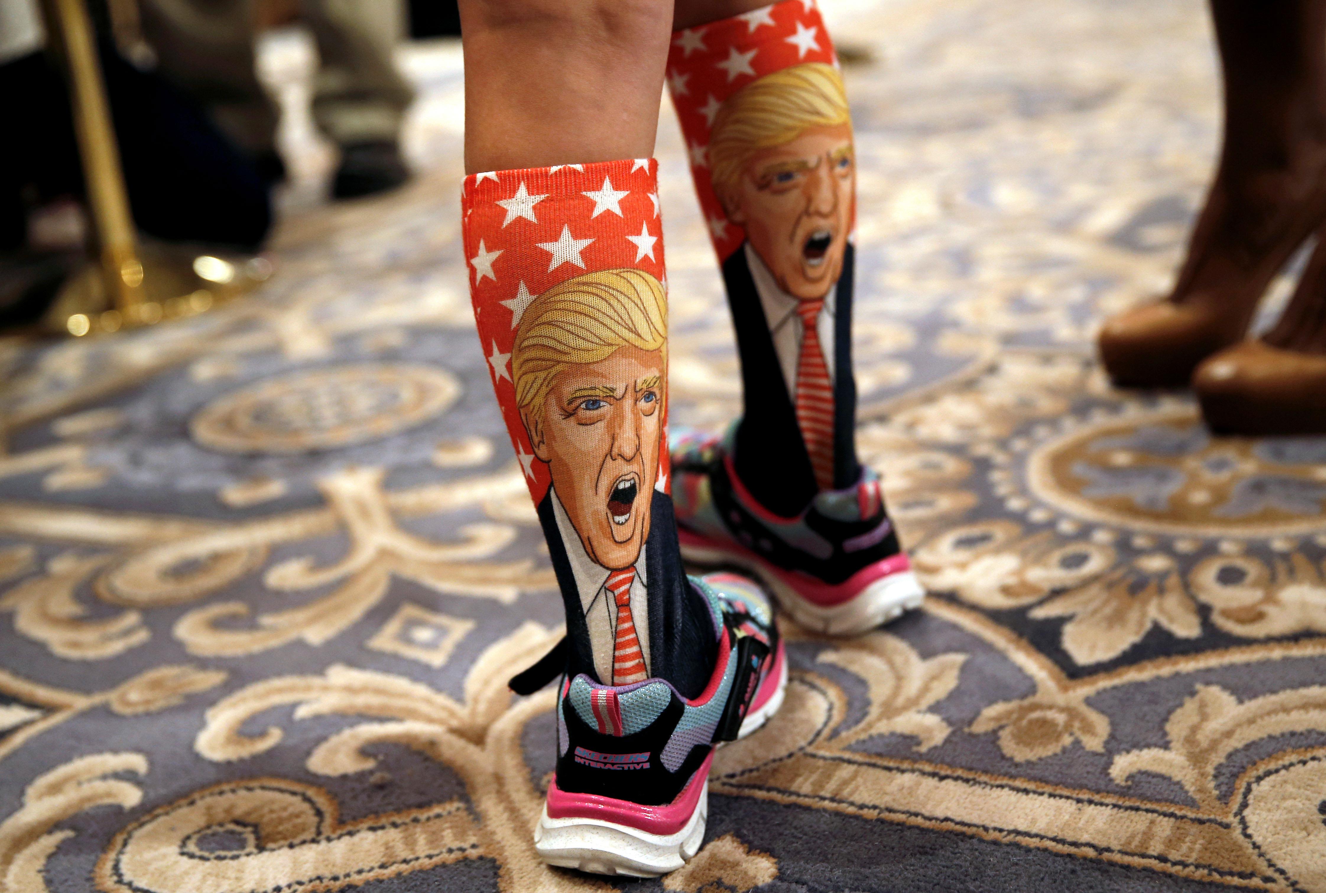11-Year-old Millie March wears socks with the image of Republican presidential nominee Donald Trump 