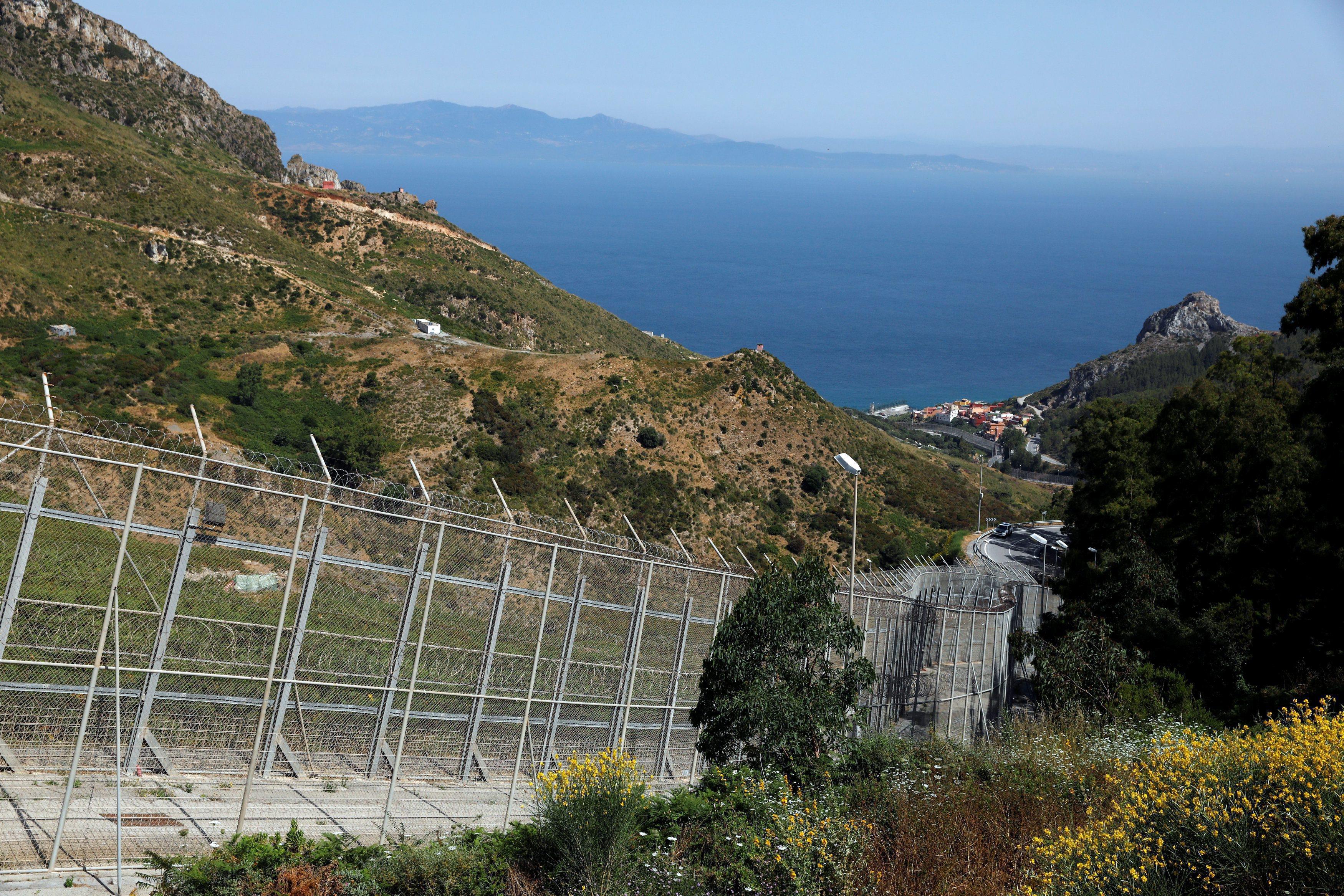 The border fence separating Spain's northern enclave Ceuta and Morocco is seen from Ceuta