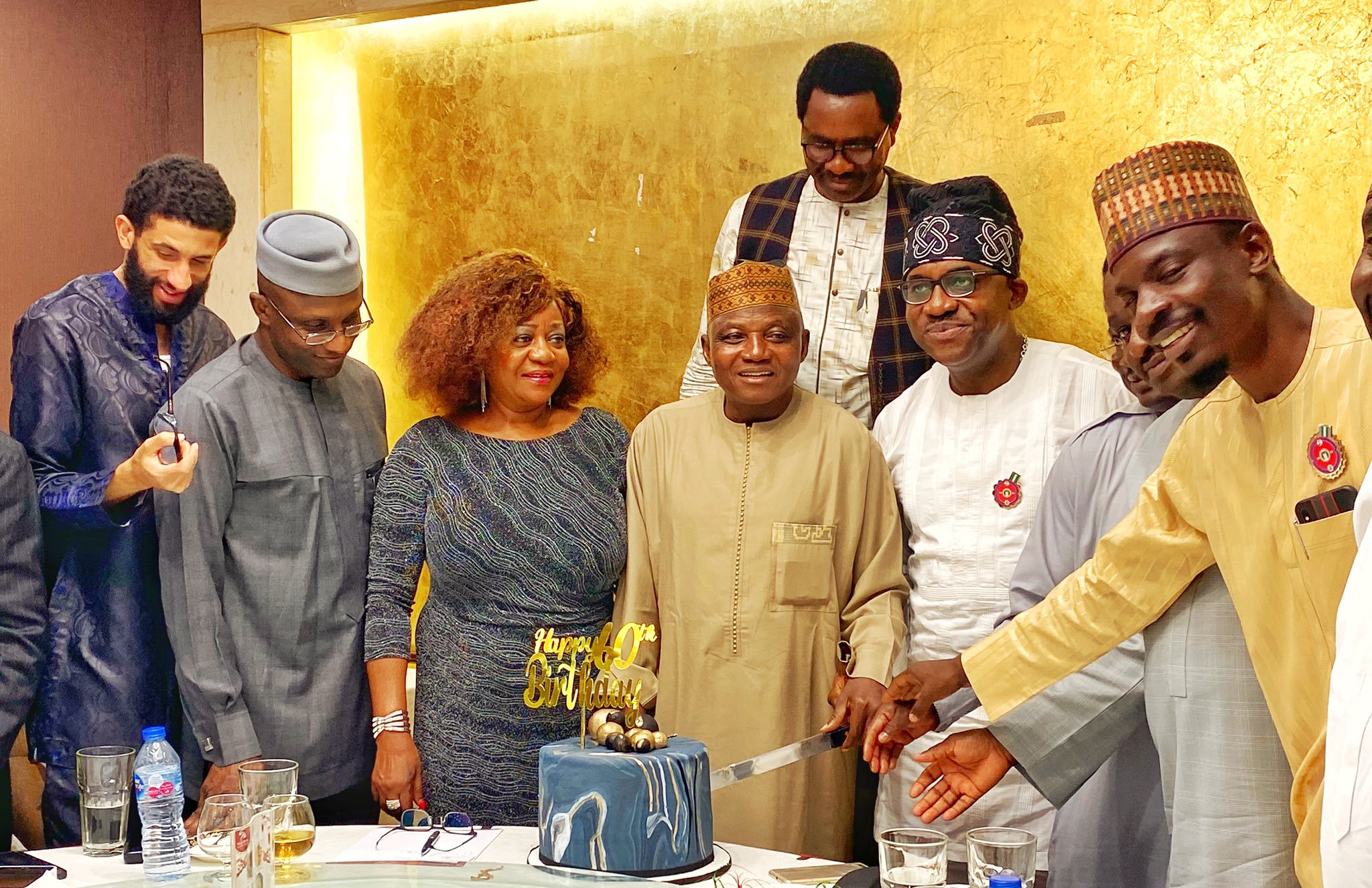 Presidential aides felicitate with the Senior Special Assistant on Media and Publicity to President Muhammadu Buhari, Malam Garba Shehu on his 60th birthday. [Twitter/@BashirAhmaad]