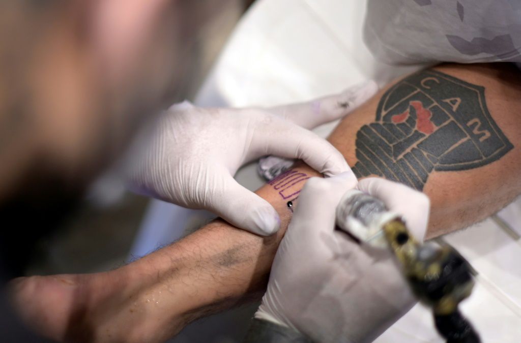 Brazil football club gives fans free tattoos