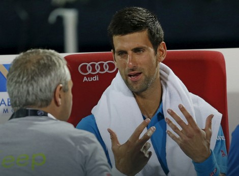 Novak Đoković sa doktorom tokom meča sa Lopezom