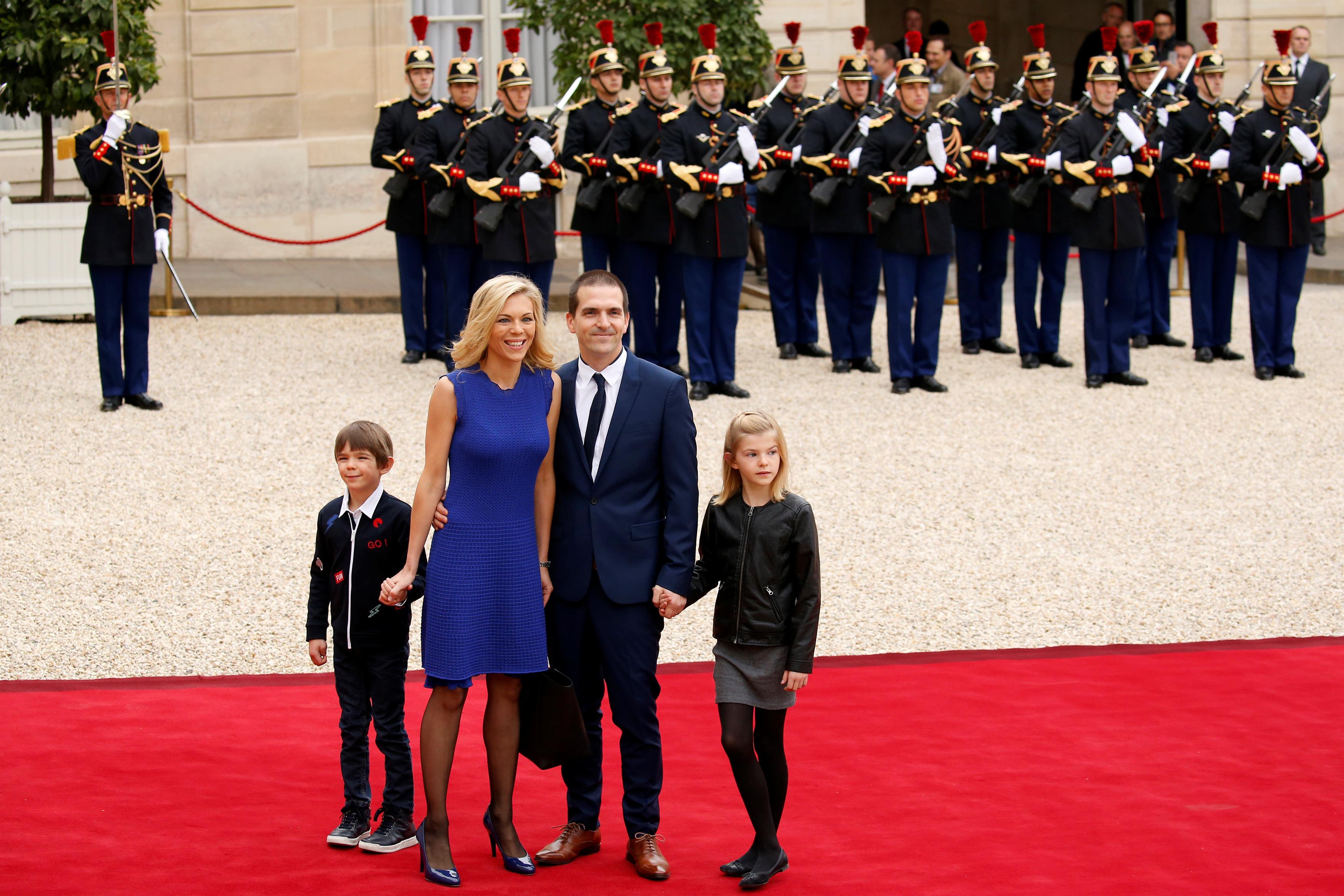 Laurence Auziere Jourdan, daughter of Brigitte Trogneux, and her husband Guillaume arrive to attend 