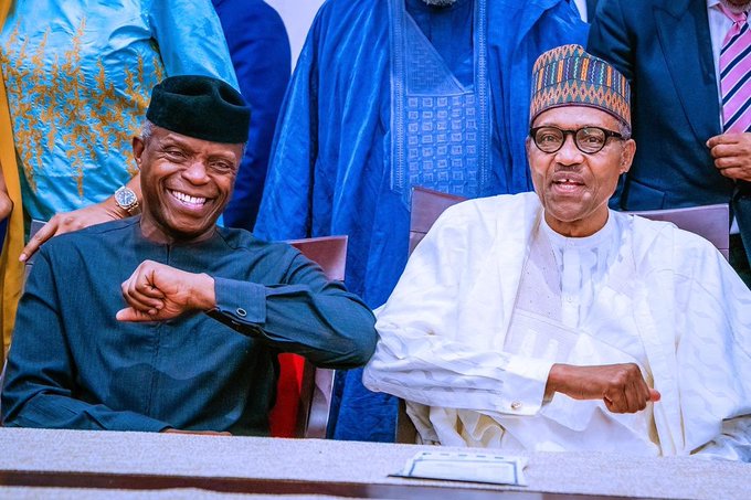 President Muhammadu Buhari and Vice President Yemi Osinbajo doing the 'Coronavirus handshake'. [Twitter/@ToluOgunlesi]