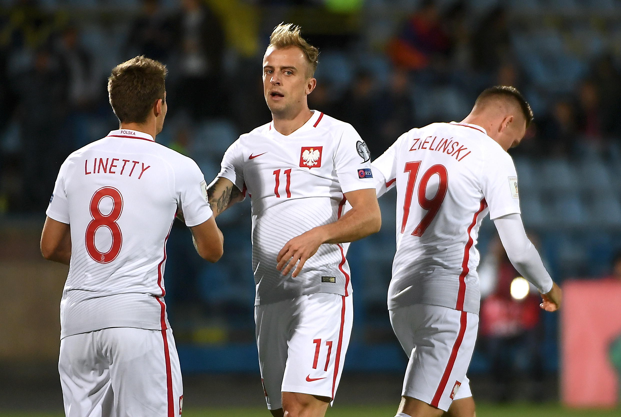 Piłkarz reprezentacji Polski Kamil Grosicki (C) po zdobyciu gola
