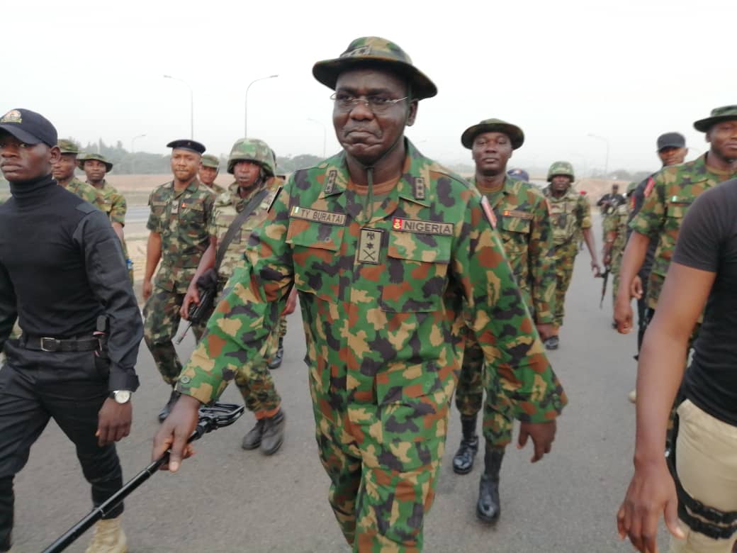 Chief of Army staff Lit-Gen. Tukur Buratai leading troops out on a parade [Twitter/@HQNigerianArmy]