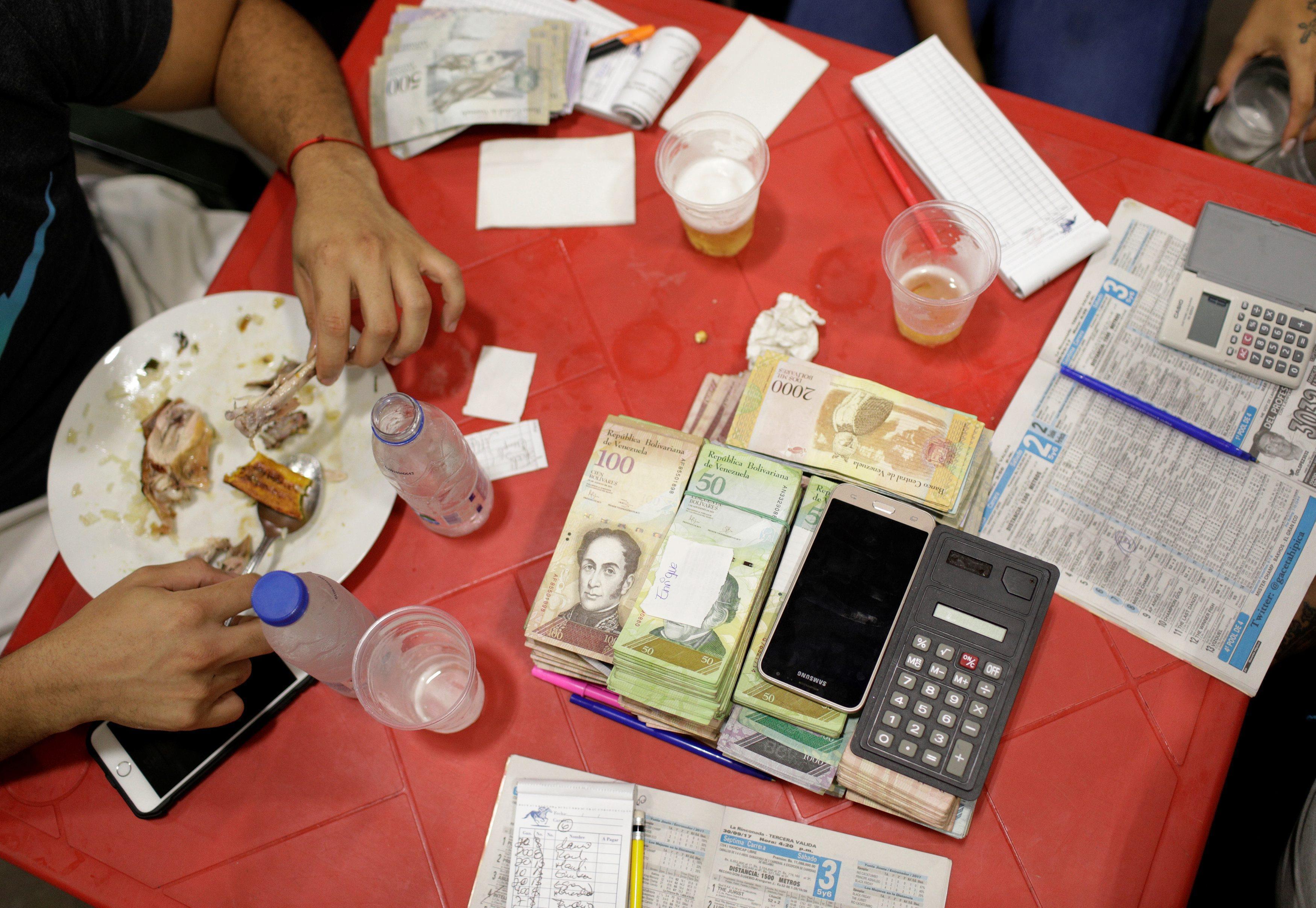 The Wider Image: Venezuelan crisis spawns boom in gambling