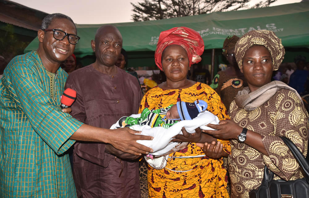  From left: The Overseer, Deeper Life Bible Church, Suleja Region, Pastor Emmanuel Oladayiye; father of the baby, Mr Christopher Osiebo; his wife, Dorcas; and wife of the Overseer, Mrs Olusola Oladayiye, during the christening of baby Emmanuel Osiebo, born to his parents after 35 years of their marriage and waiting, in Suleja, Niger State. [NAN]