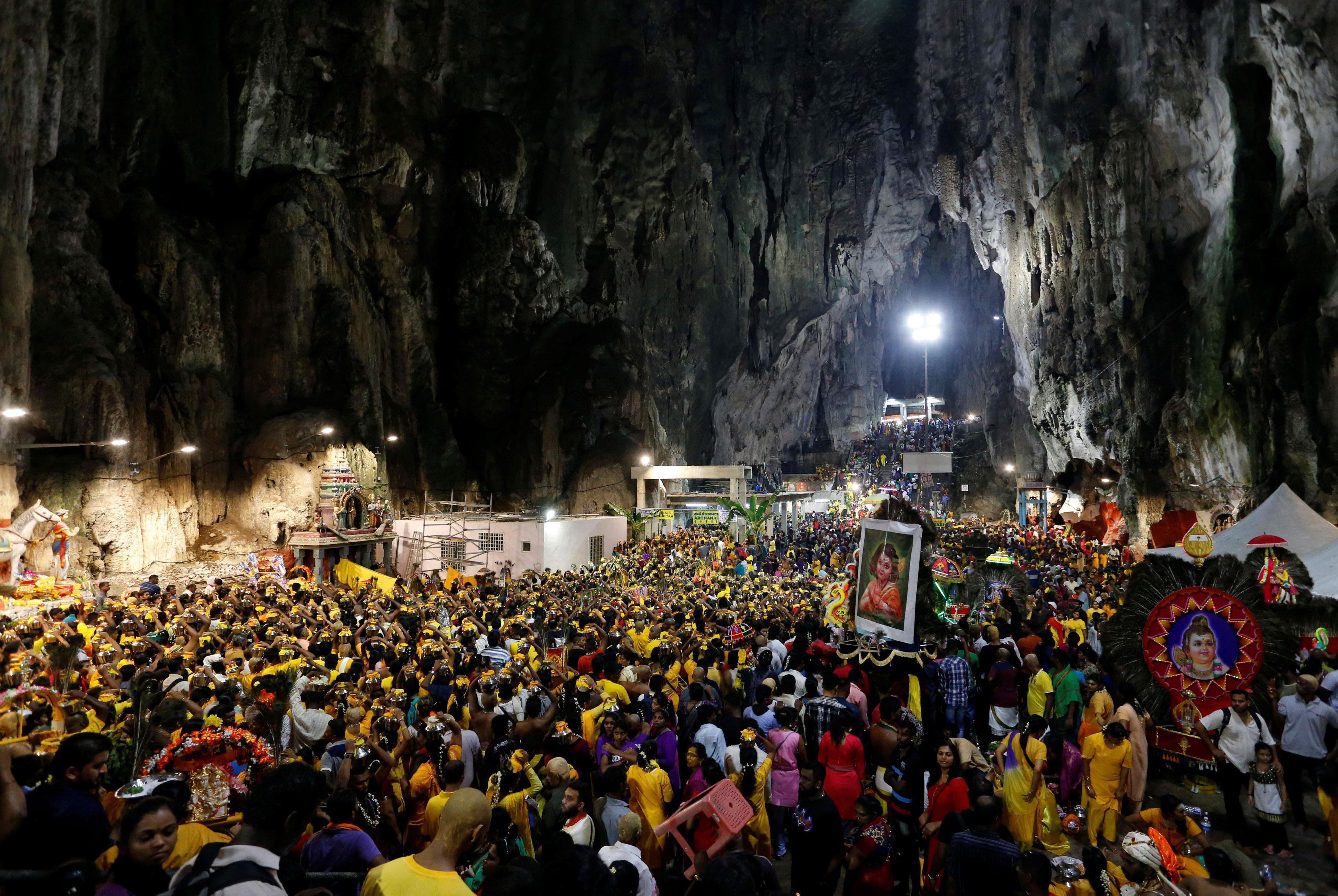 Devotees gather at a shrine in Batu Caves during the Hindu festival of Thaipusam in Kuala Lumpur