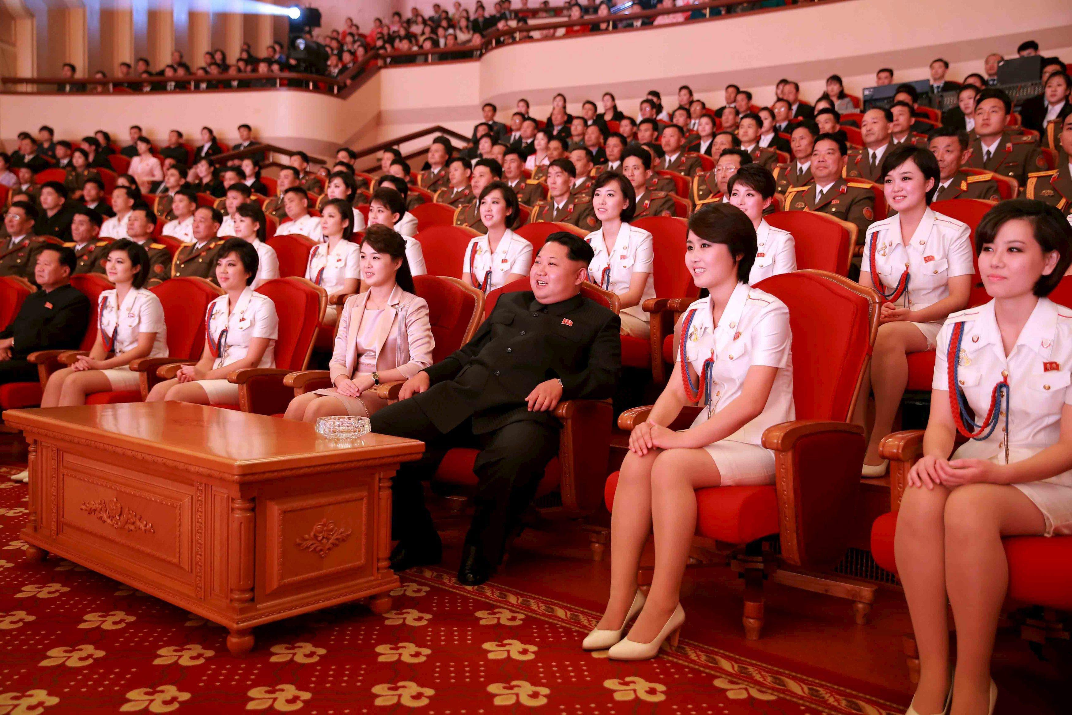 North Korean leader Kim Jong Un and wife Ri Sol Ju enjoy an art performance given by the Chongbong B