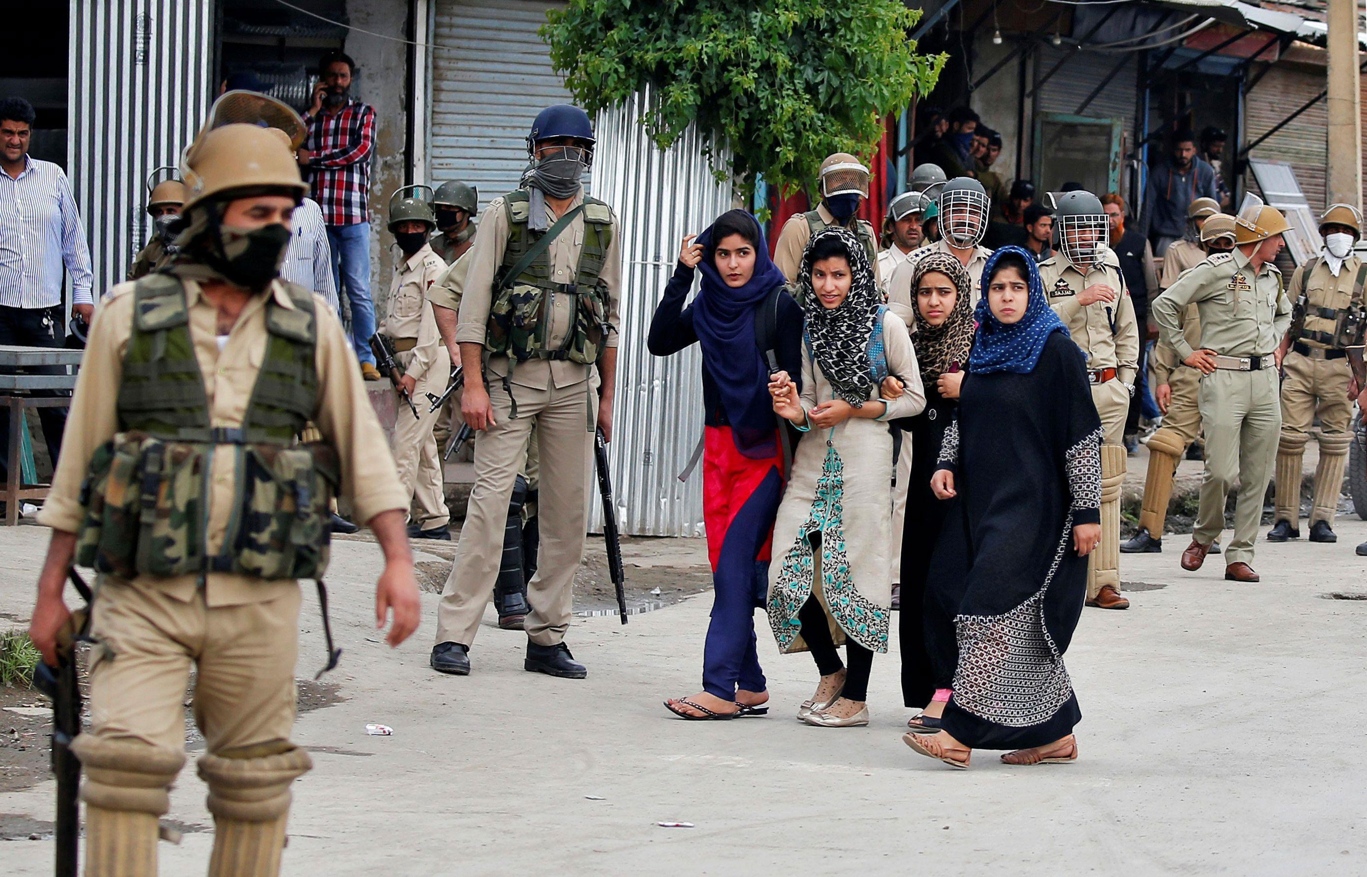 The Wider Image: Kashmir's stone-pelters face off against pellet guns