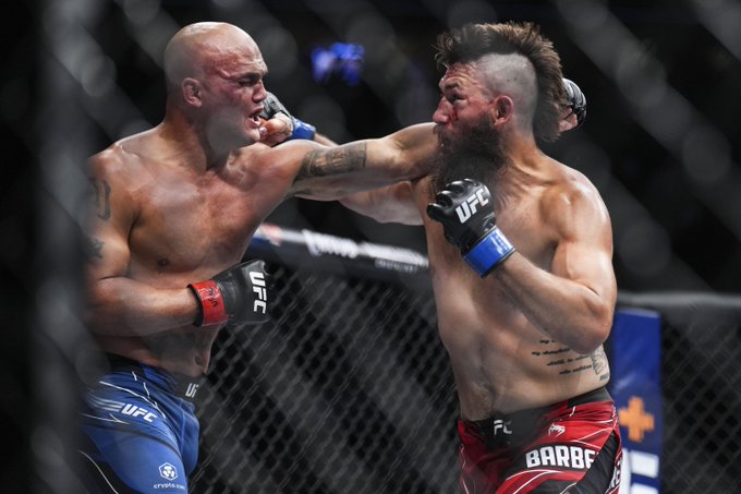 Robbie Lawler (L) engaged in a proper brawl with Bryan Barberena 