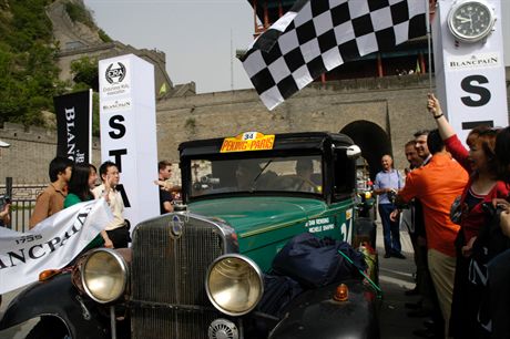 Car 34, Dan Rising and Michele Shapiro driving their 1930 Chevy Coupe start the Rally at the foot of GreatWall in Beijing. May 27.\ : Rising and Michele Shapiro 1930 Chevy Coupe : Dan Rising and Michele Shapiro (China)