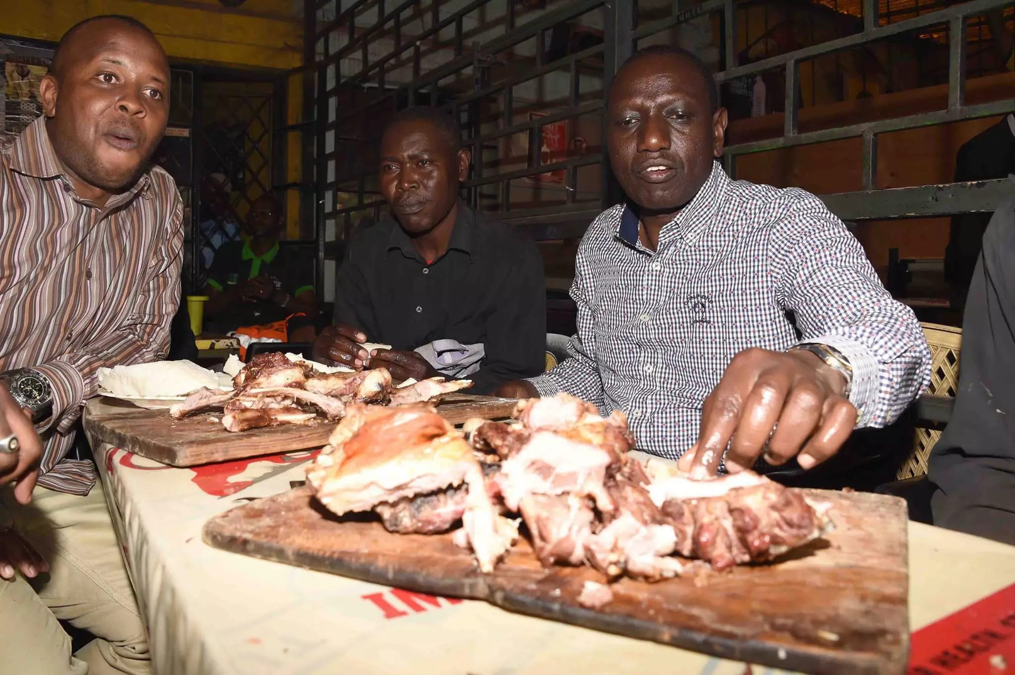 Kenya's Deputy President William Ruto enjoying Nyama choma