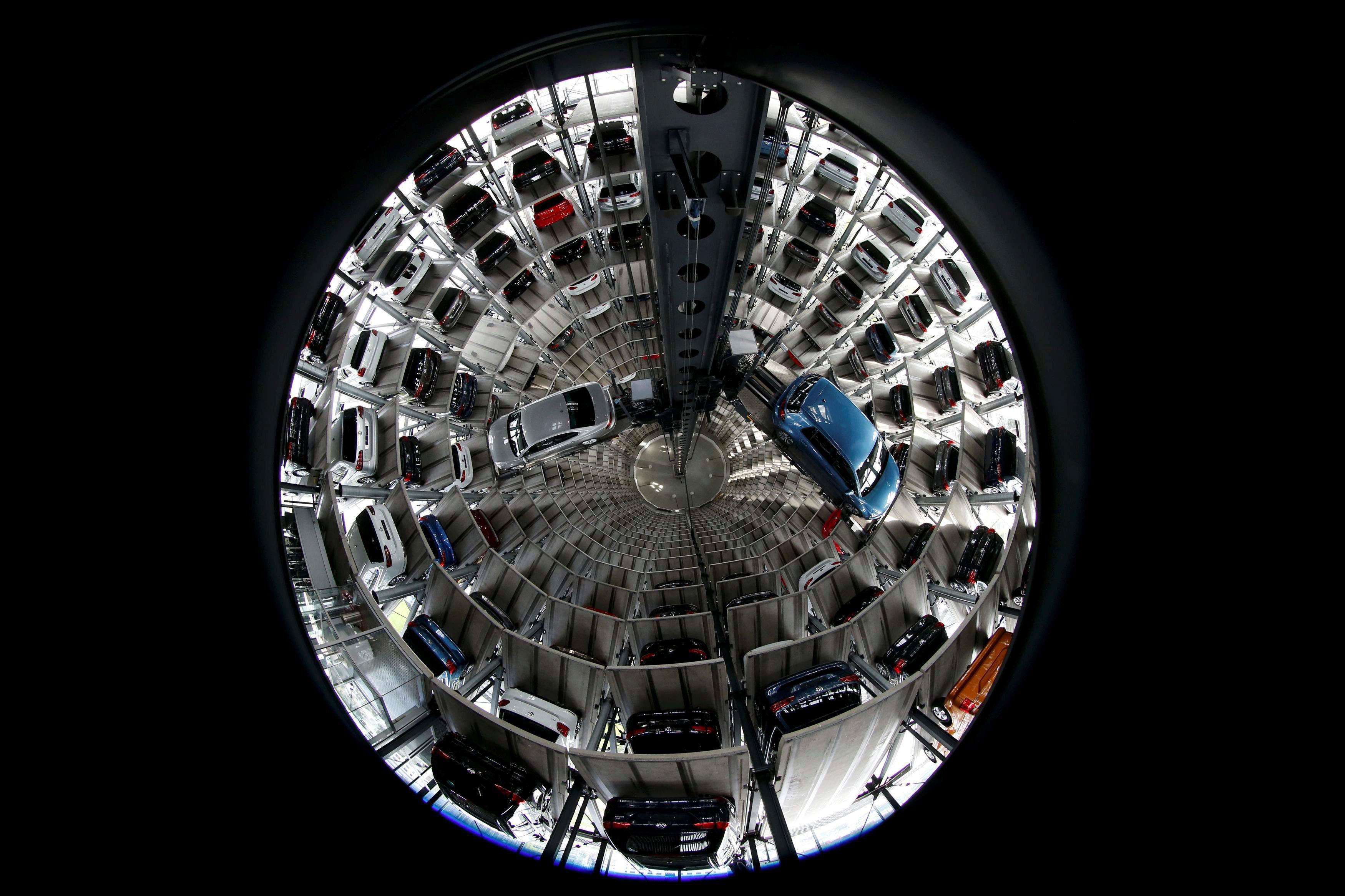 Volkswagen cars are loaded in a delivery tower at the plant of German carmaker in Wolfsburg