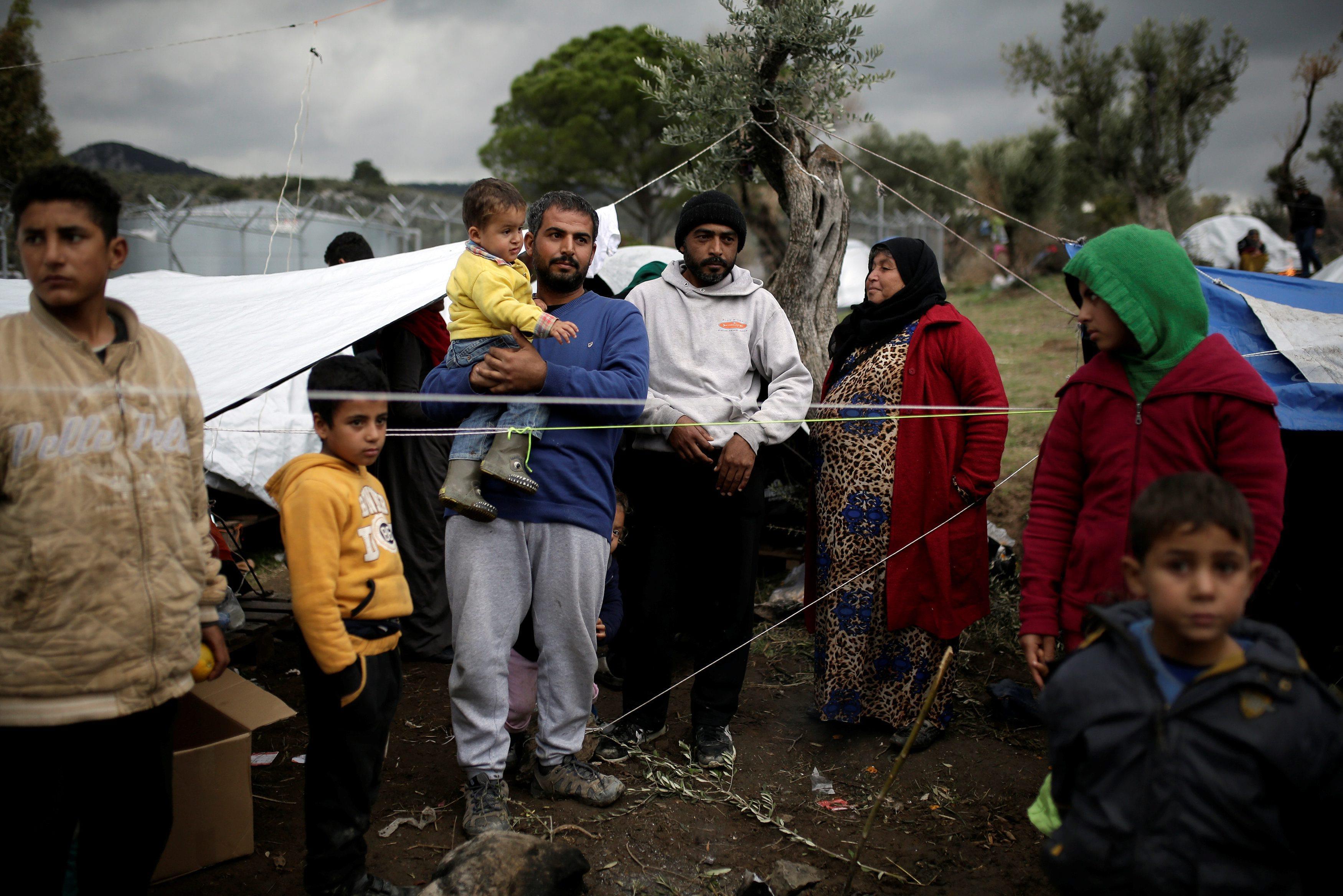 The Wider Image: The Greek island holding back a human tide