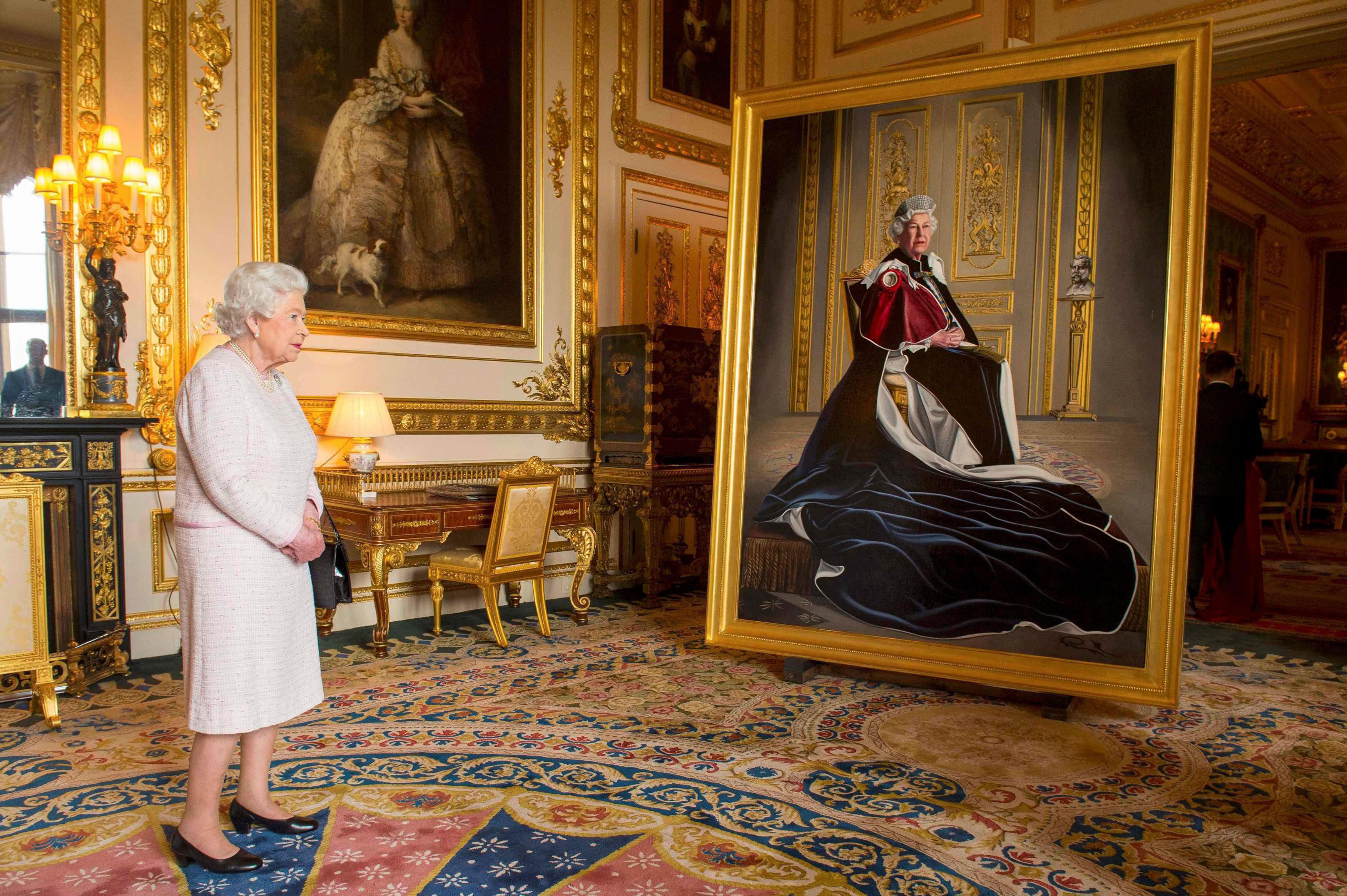 Britain's Queen Elizabeth views a portrait of herself by British artist Henry Ward, commissioned to 
