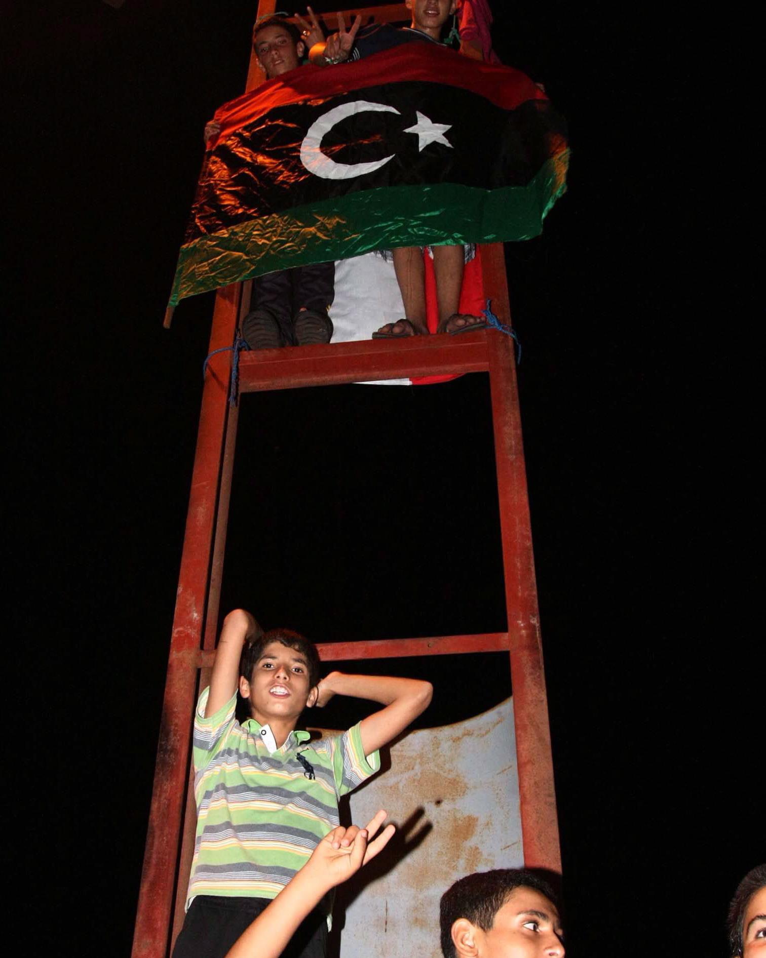 Trypolis_Najmłodsi mieszkańcy stolicy Libii witają powstańców. 