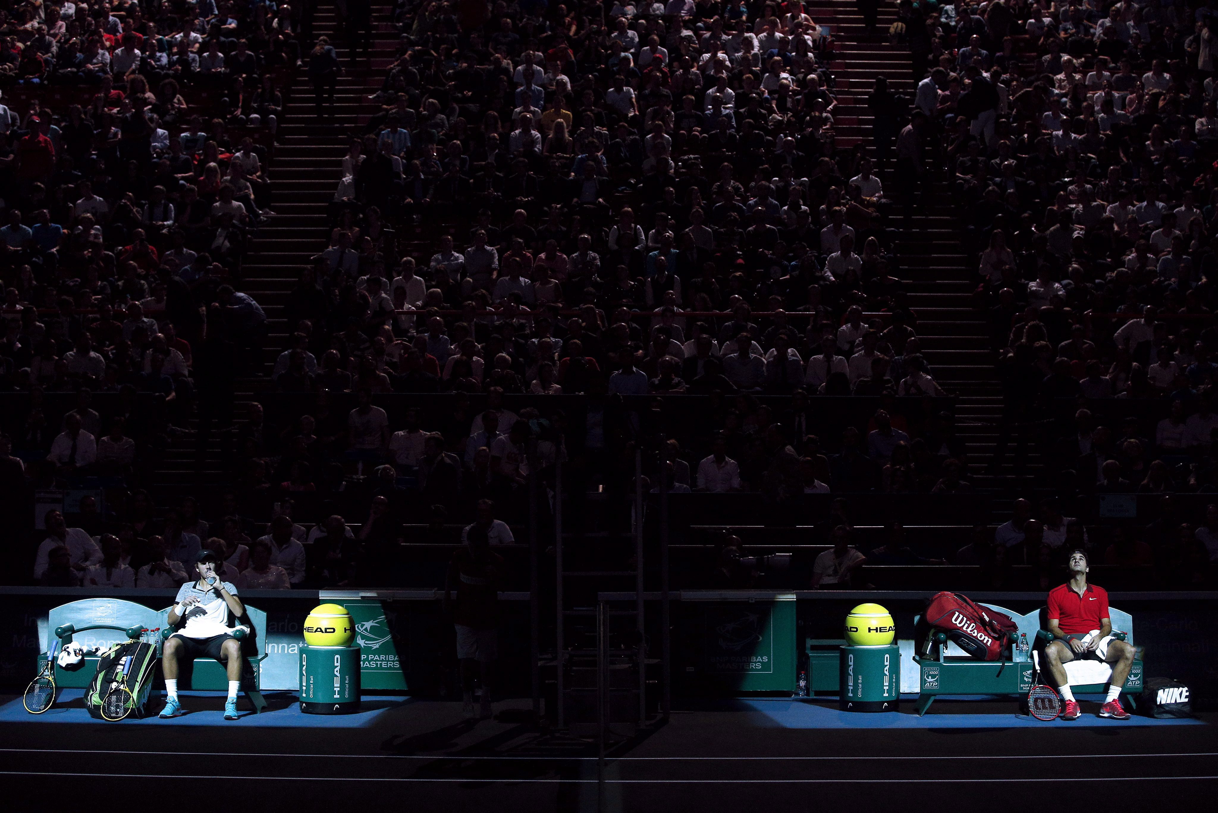 Roger Federer i Lucas Pouille podczas meczu turnieju BNP Paribas 2014 Masters