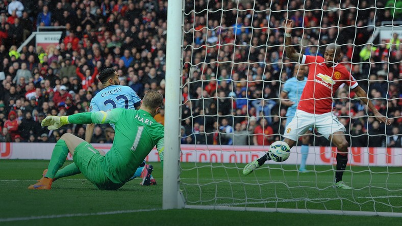 Ashley Young scores in his Manchester City