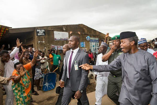 Osinbajo interacts with traders at Garki Market