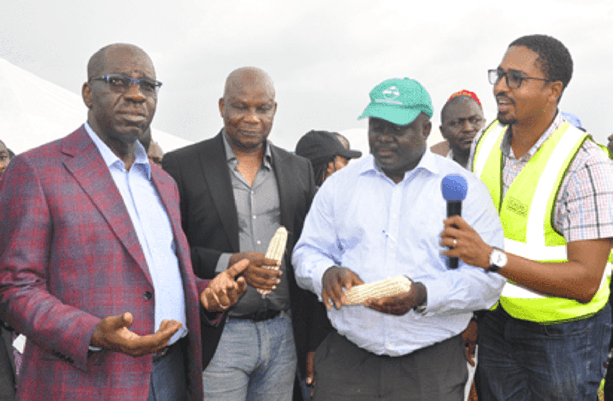Aliyu on the field with Edo Governor Godwin Obaseki (Vanguard)