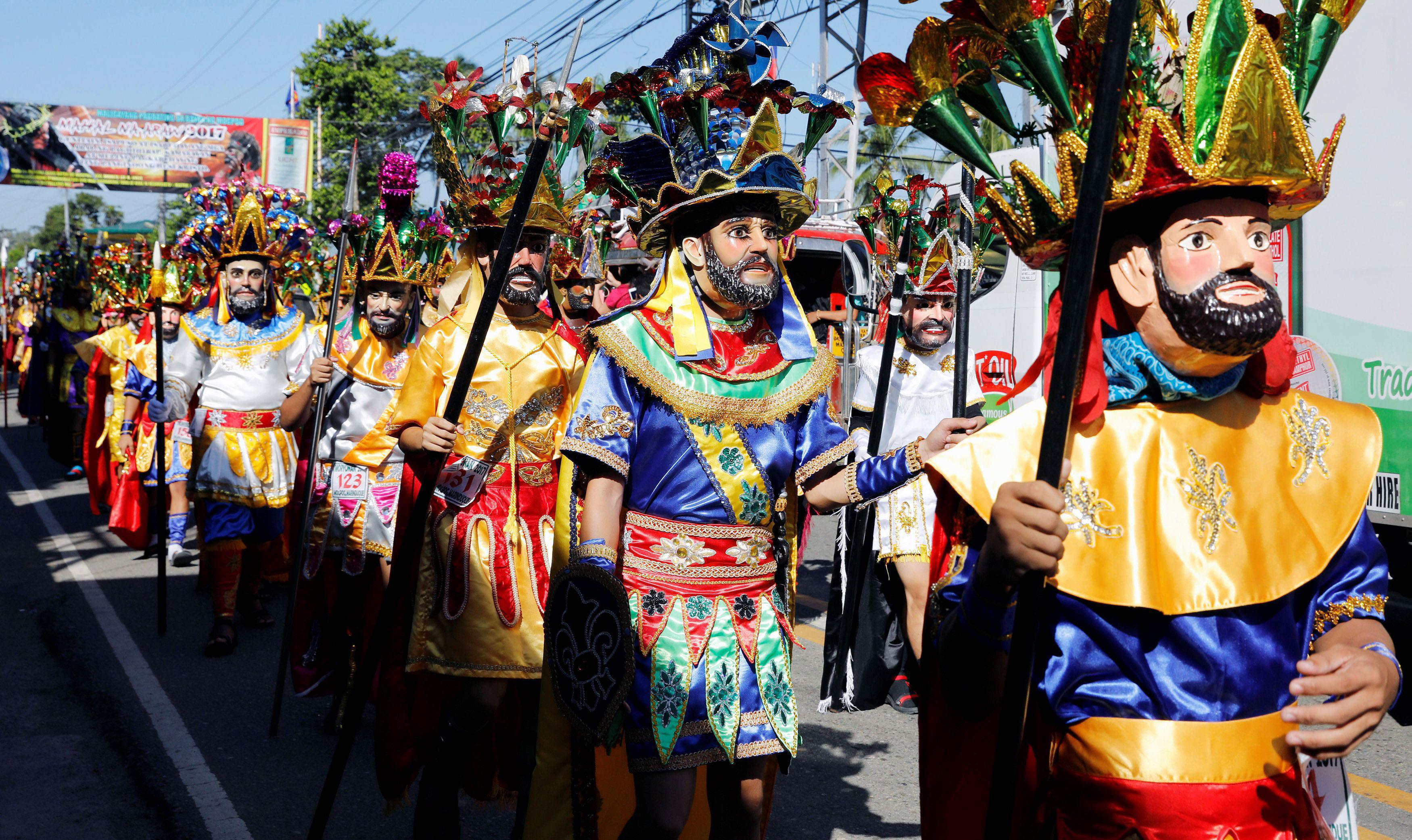 Penitents wear masks and centurion costumes during a local Lenten ritual called 