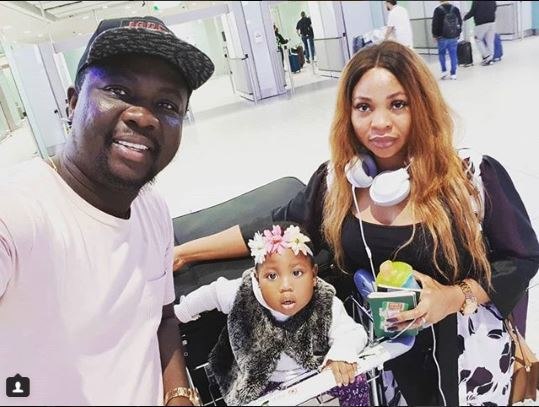 Seyi Law with wife and daughter