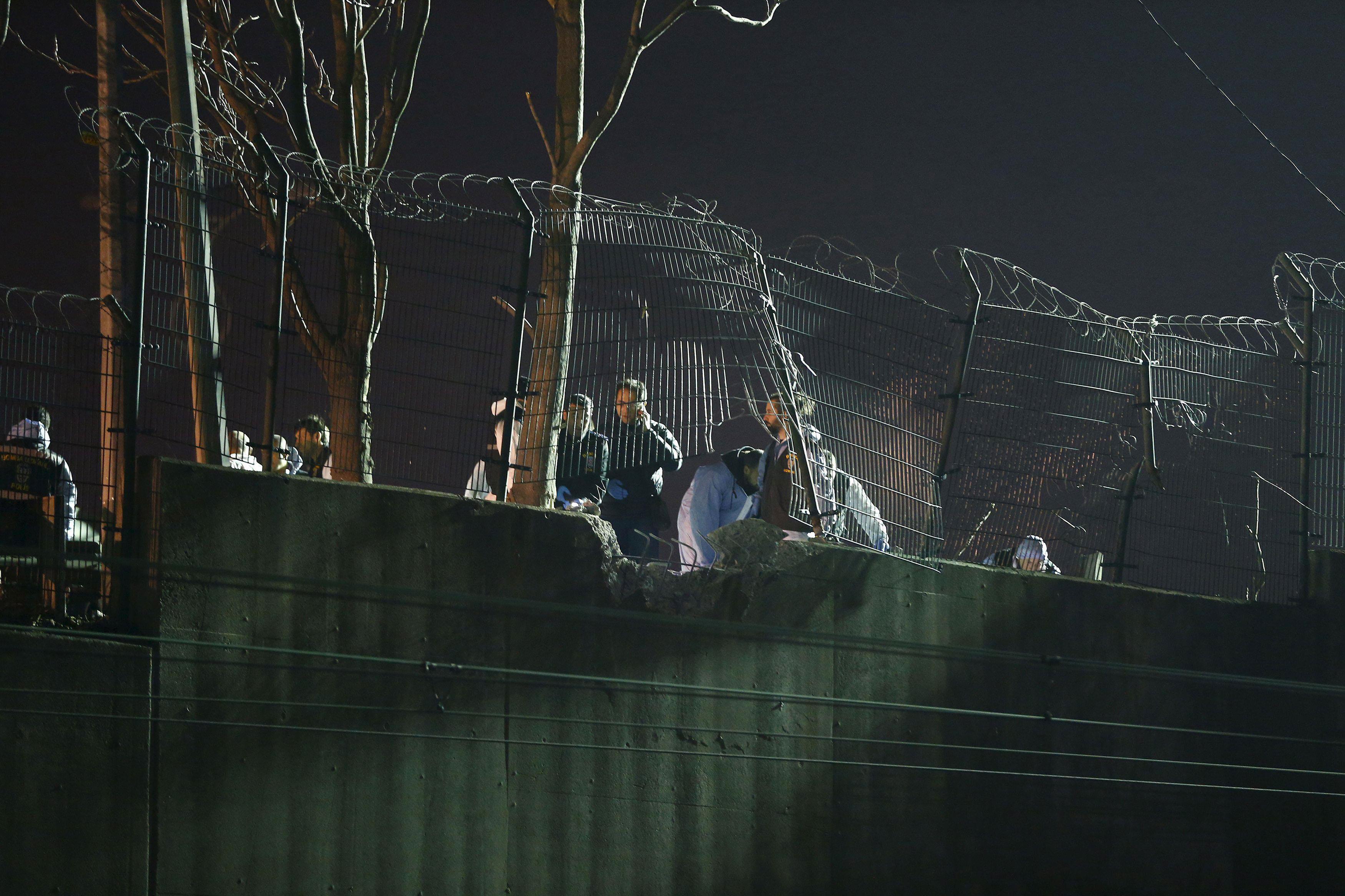 Forensic officers work on the blast scene in Istanbul