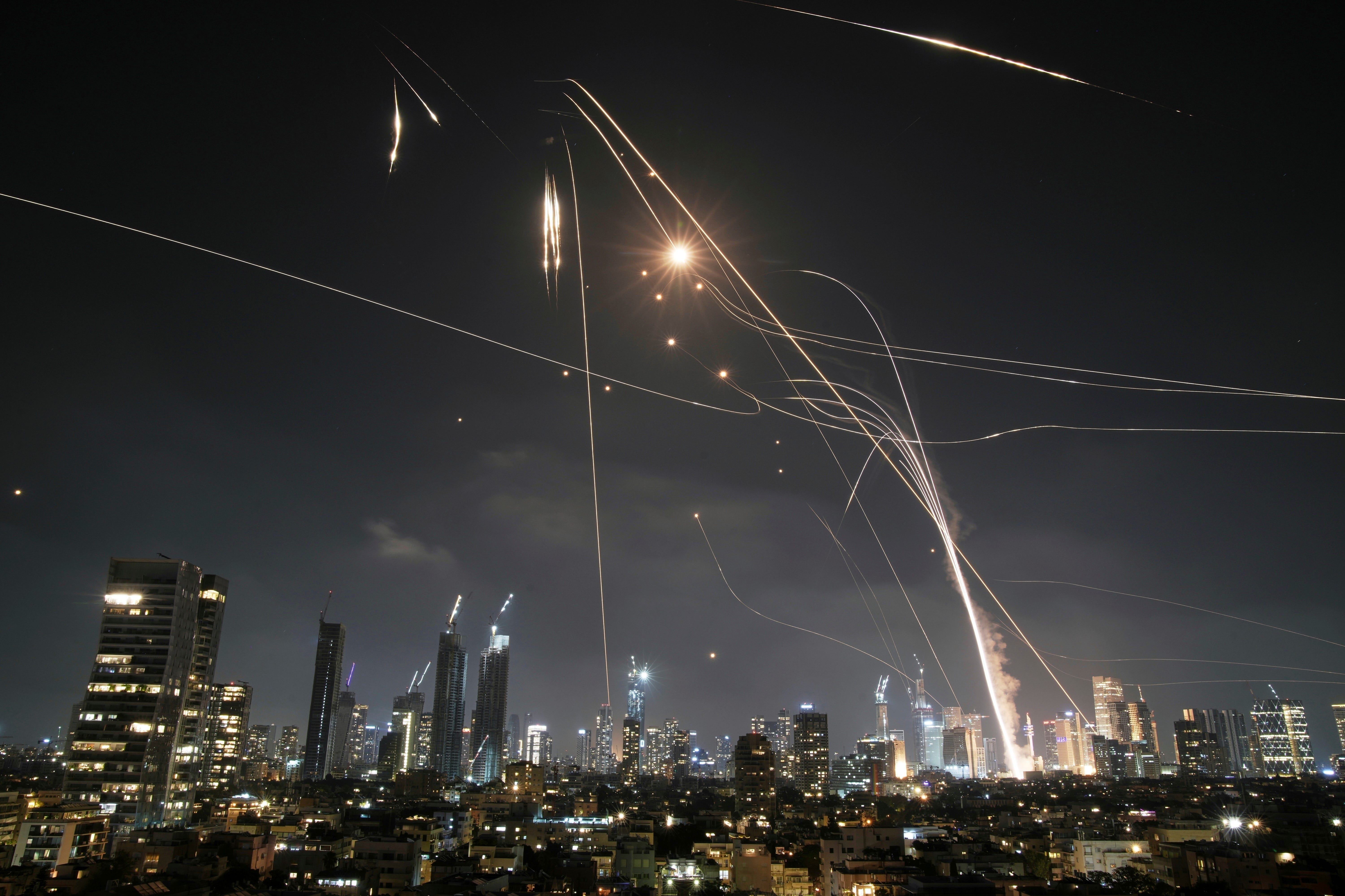 Iran and Israel exchanging missile strikes Tel Aviv on Friday. [AP Photo/Leo Correa]