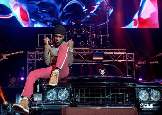 Burna Boy on stage at his Life On The Outside Tour in UK [BukiHq]