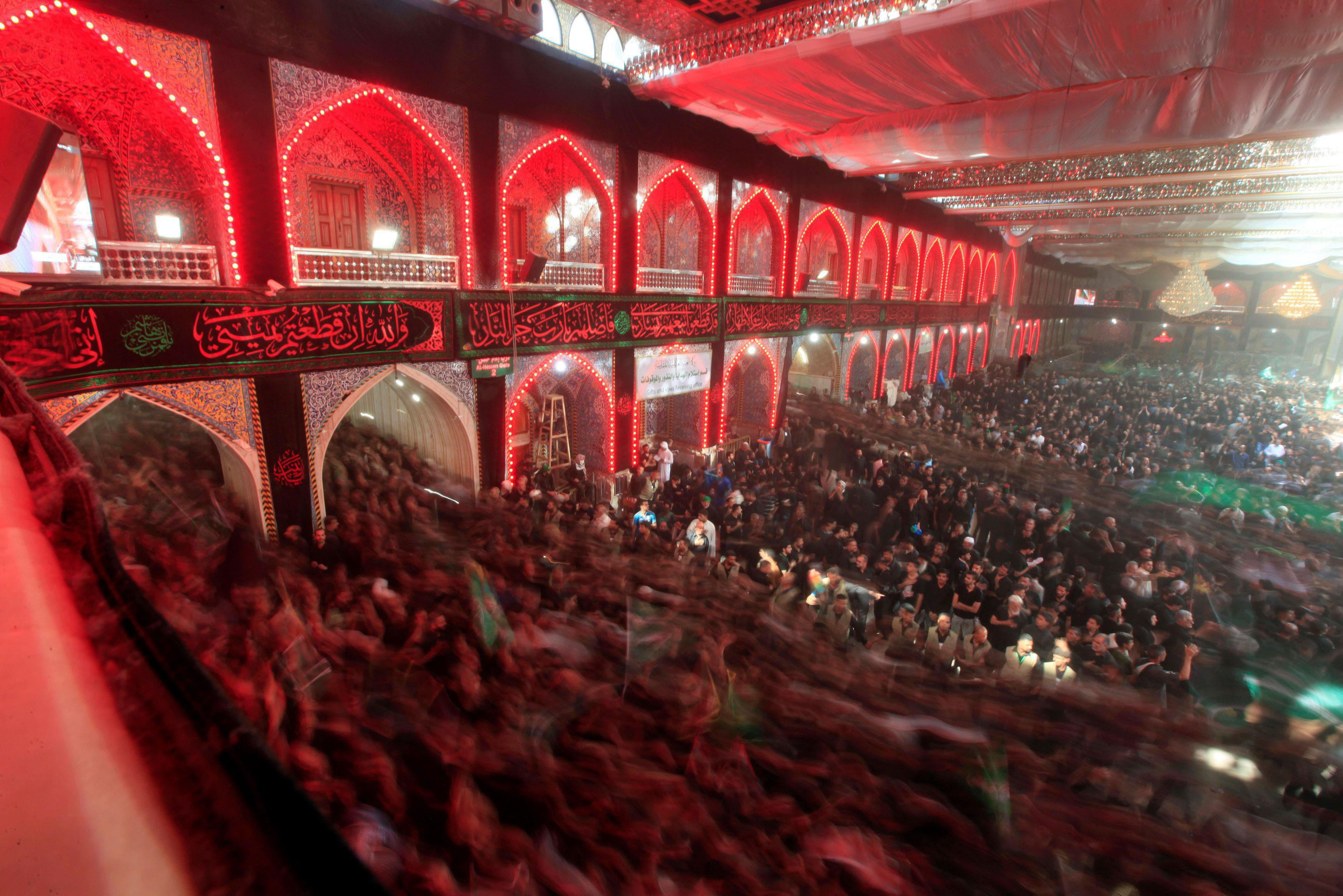 Shi'ite Muslim pilgrims gather as they commemorate Ashura in Kerbala
